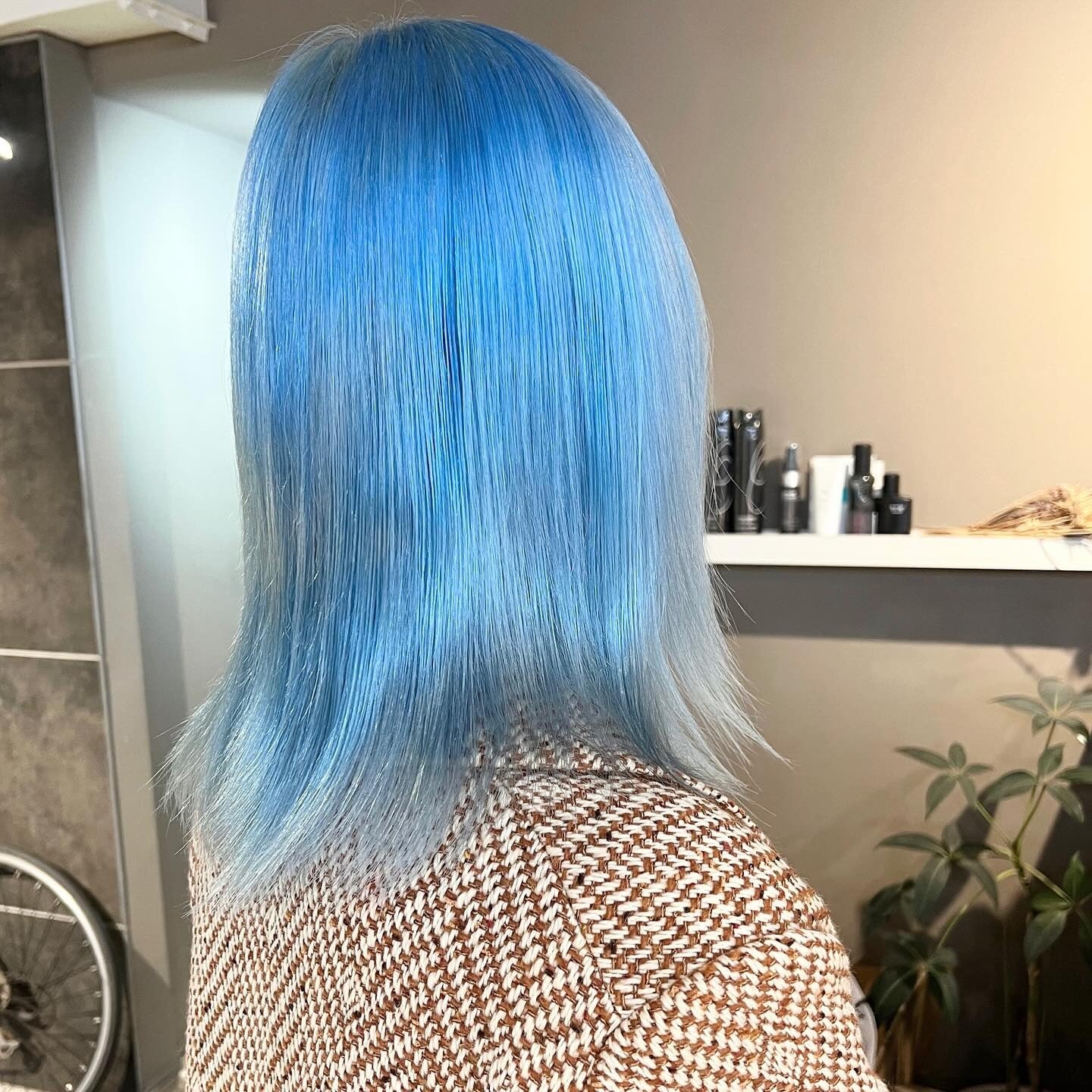 5. Straight Mid-Length with Ice Blue Glow (Light Blue Hair Color)