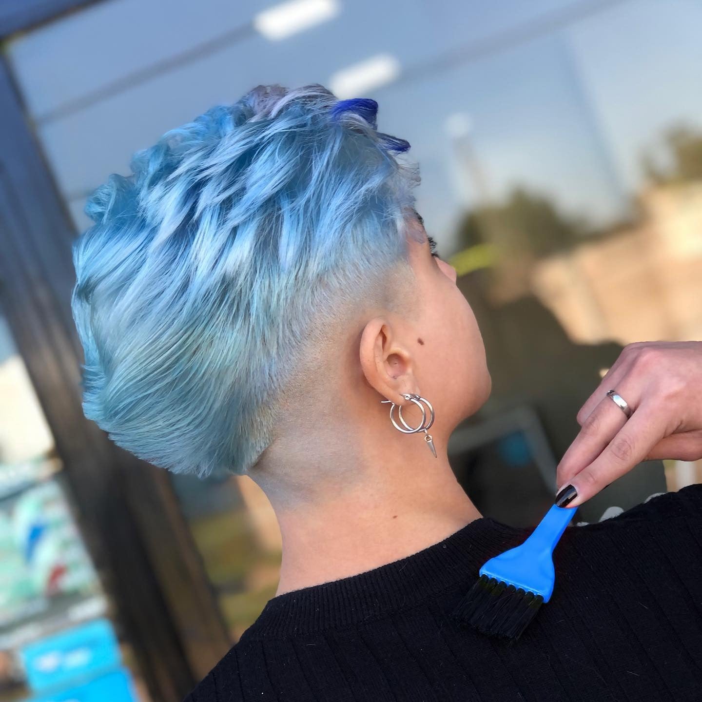 9. Tapered Undercut with Frosted Blue Layers (Light Blue Hair Color)