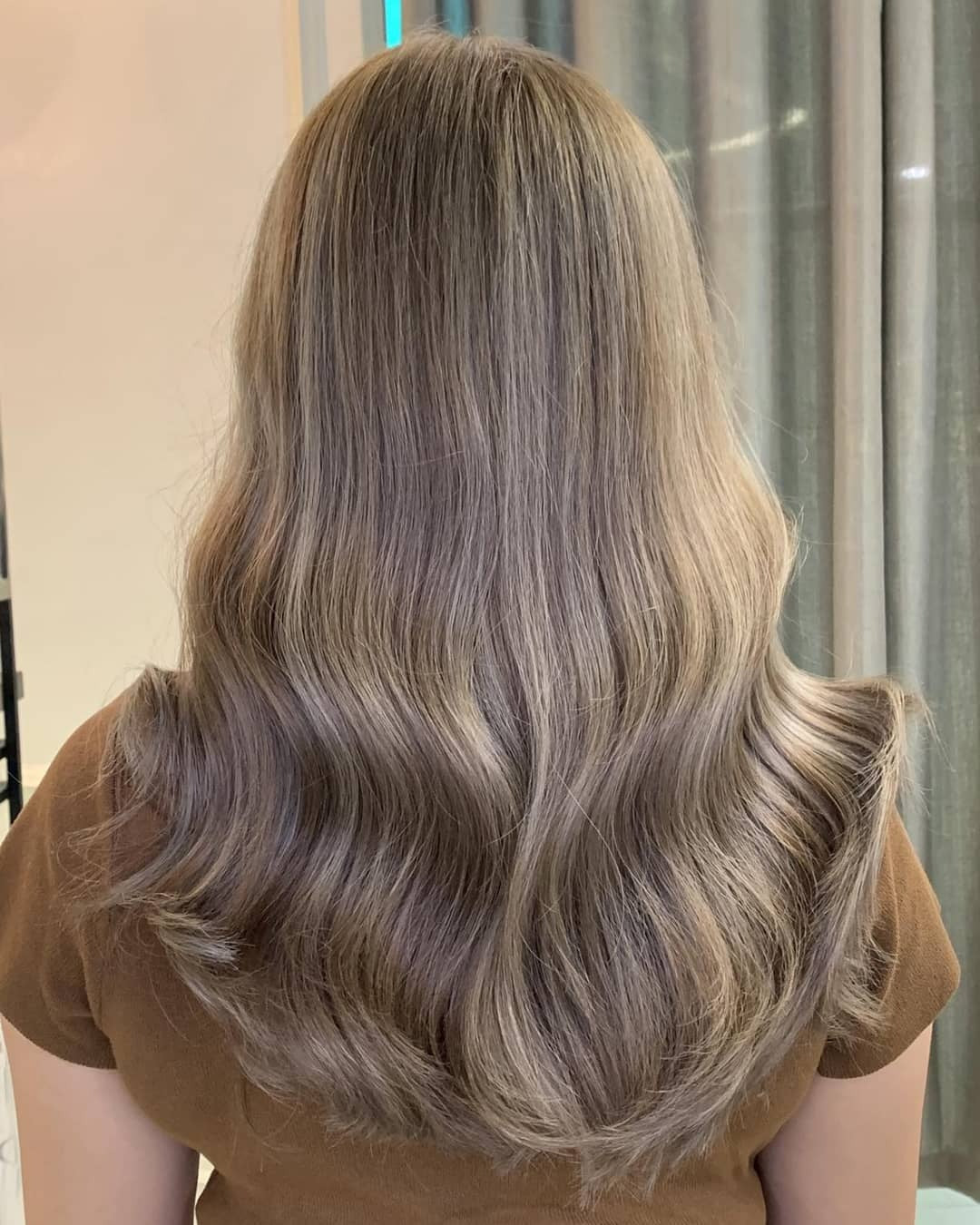 5. Ashy Milk Tea Glow with Gentle Waves (Milk Tea Hair Color)