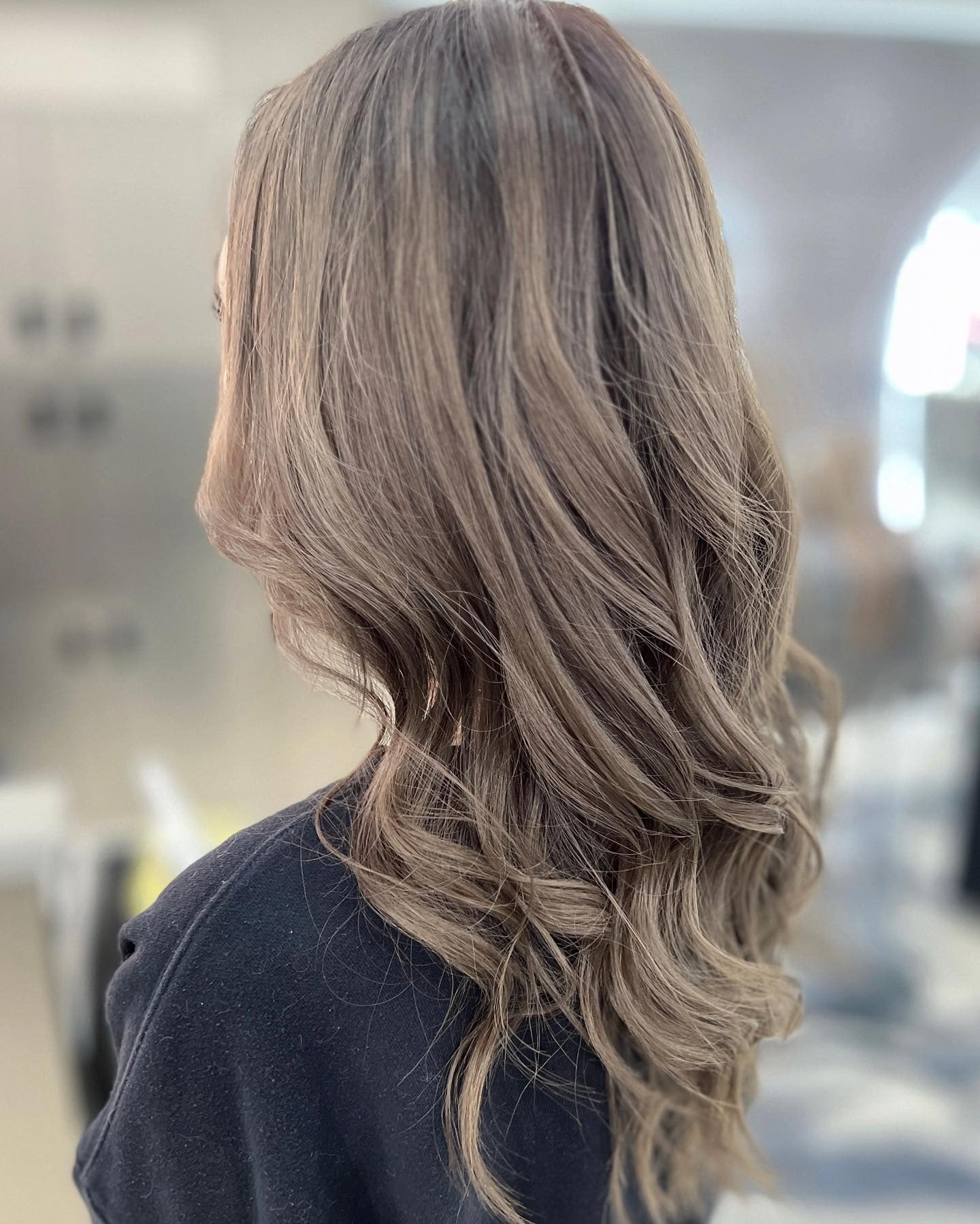 10. Cool-Toned Milk Tea Layers with Subtle Curls (Milk Tea Hair Color)