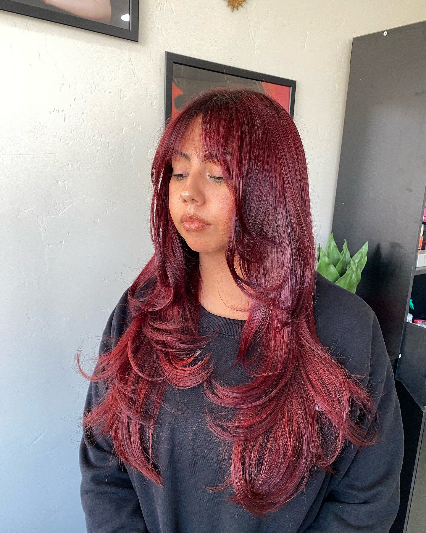 12. Feathered Cherry Red Layers with Bangs (Cherry Red Hair Color)