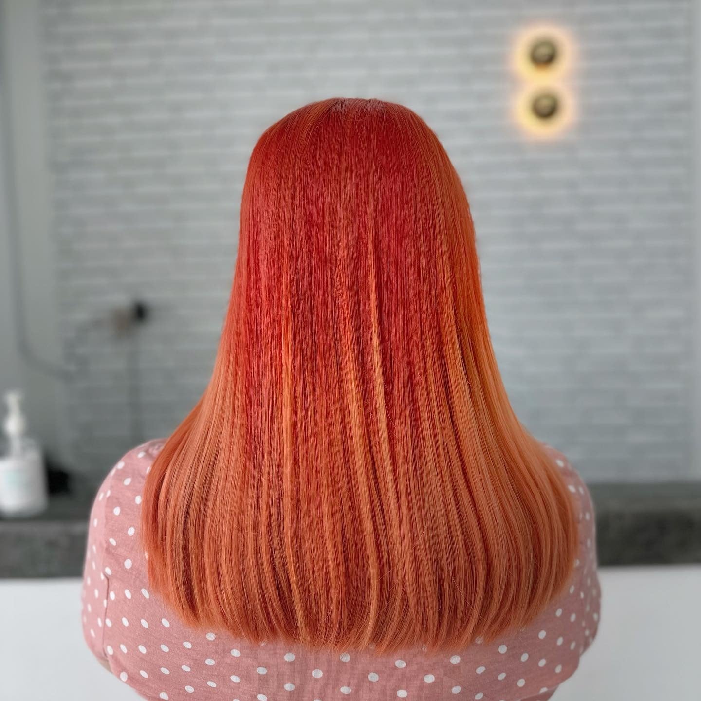 3. Smooth Tangerine Mid-Length Fade (Orange Hair Color)