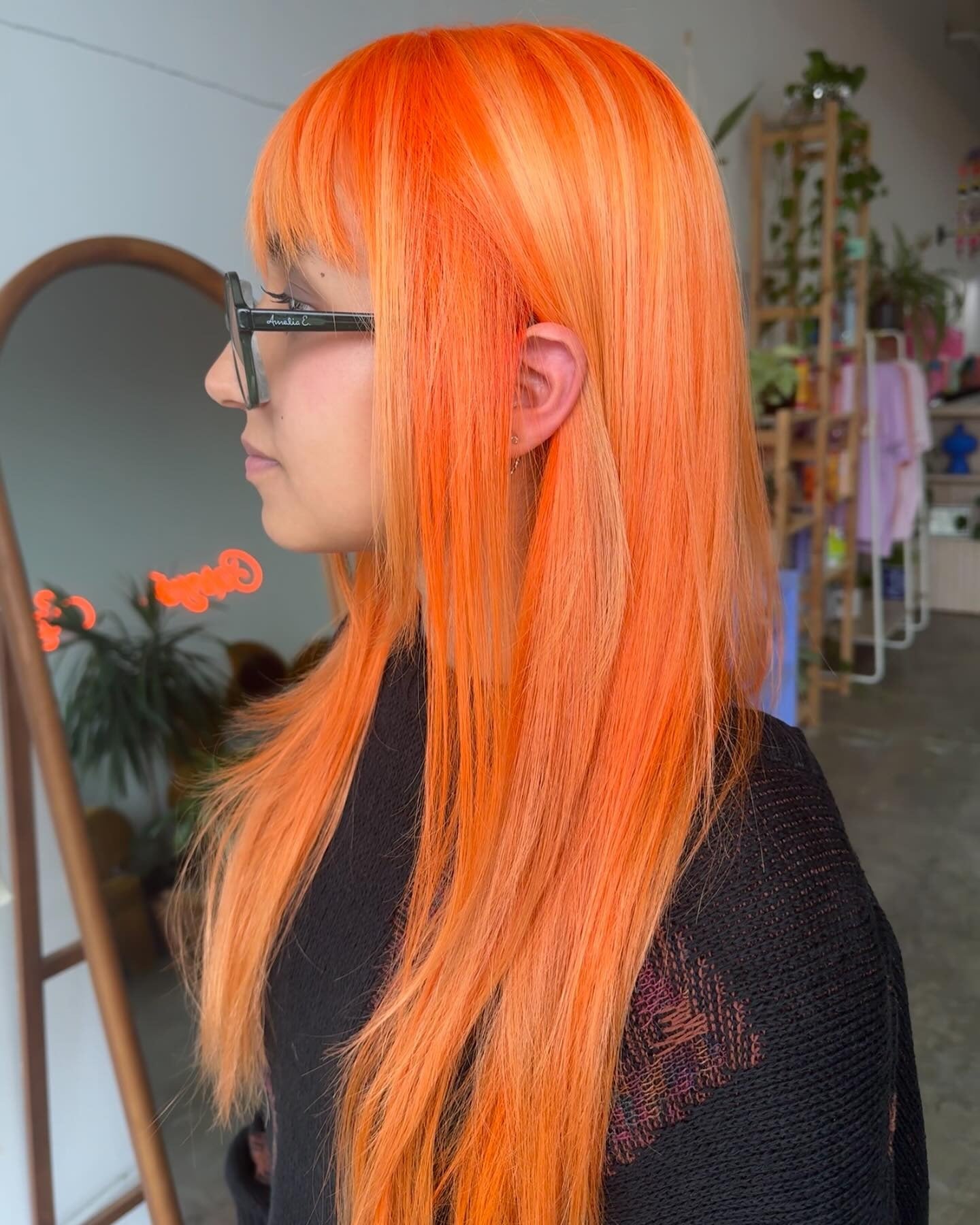 10. Straight Neon Orange with Fringe Layers (Orange Hair Color)