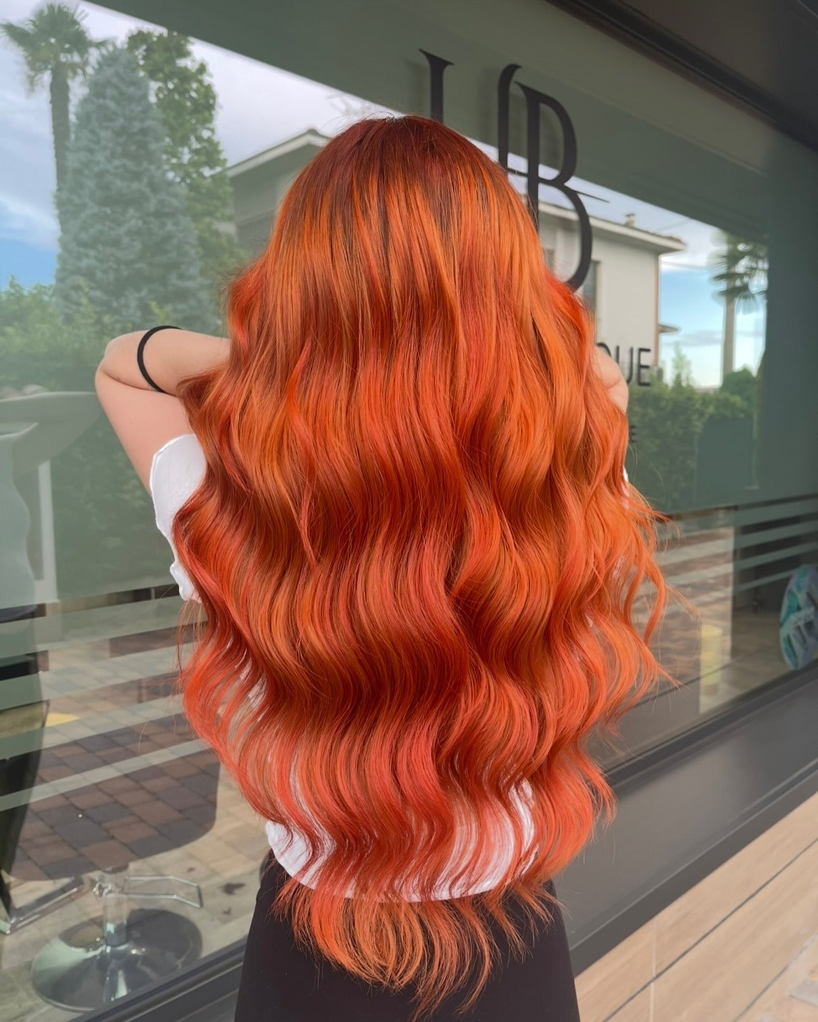 12. Cinnamon Orange Glamour Waves (Orange Hair Color)