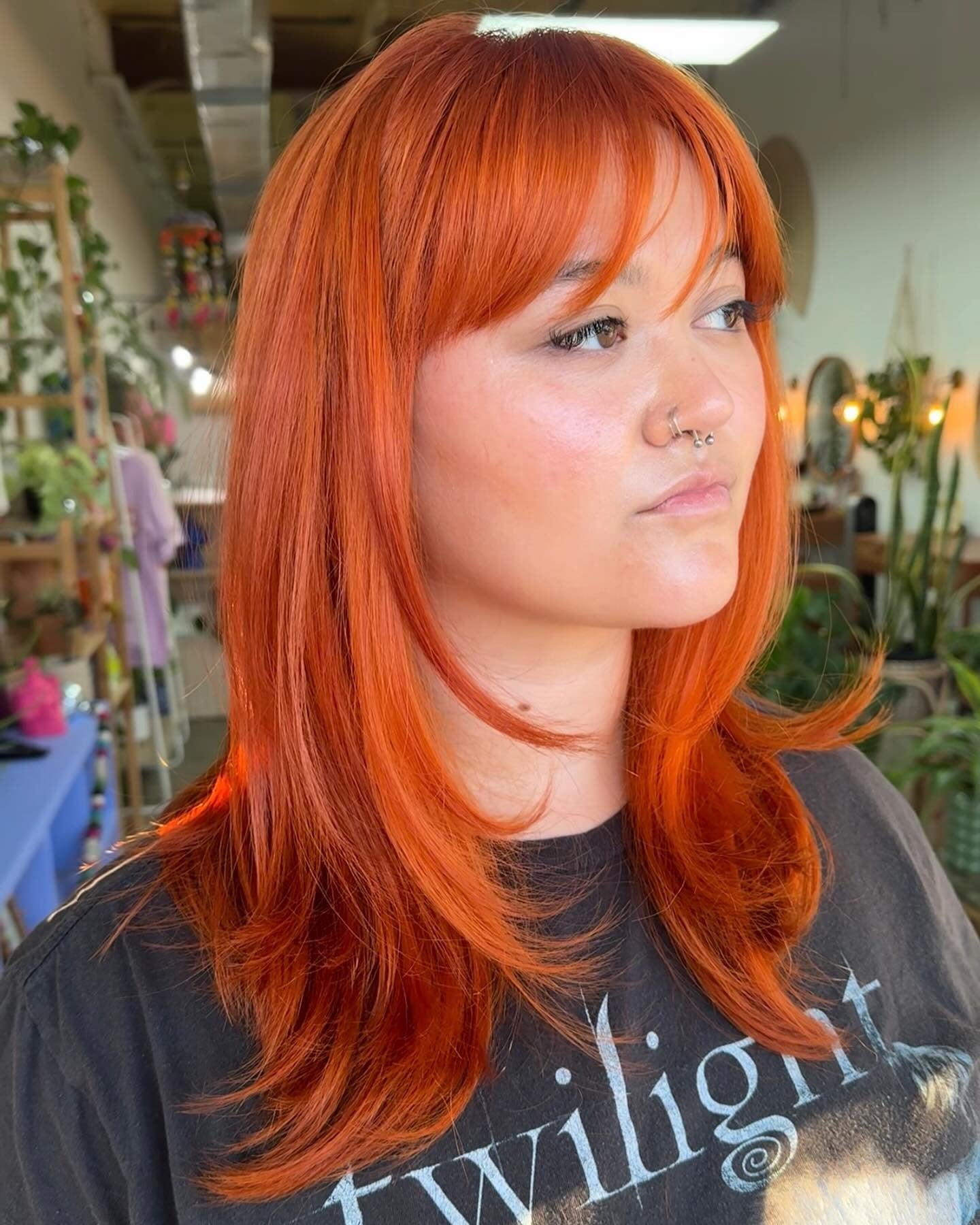 14. Mid-Length Layers with Wispy Fringe in Spiced Orange (Orange Hair Color)