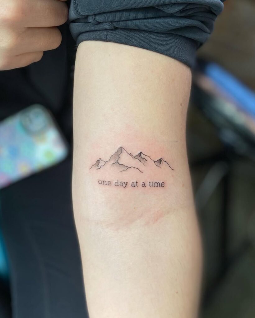 Mountain Tattoo With A Motivational Quote
