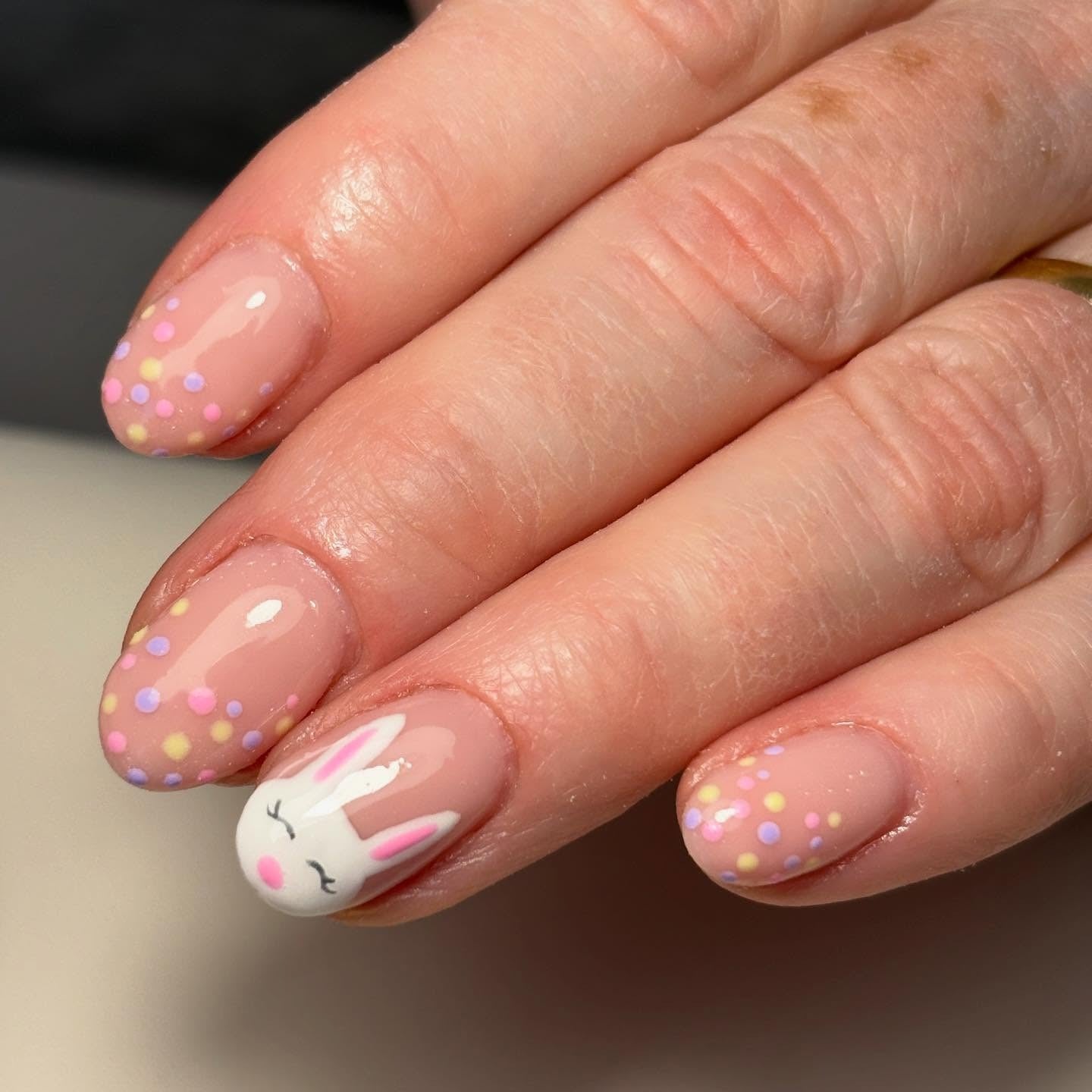 3. Blushing Bunny with Pastel Dots (Easter Nail Ideas)