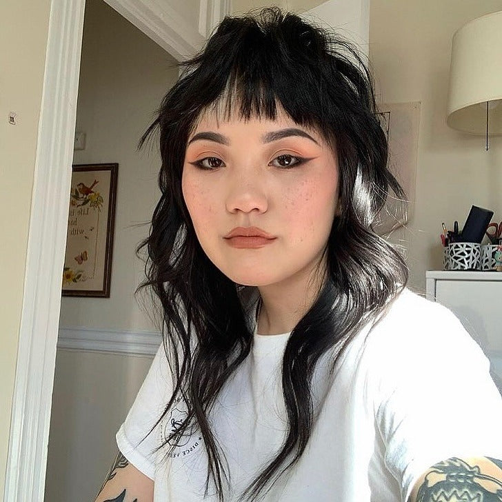 1. Soft Jet Black Shag with Choppy Fringe (Shaggy Mullet Haircut)