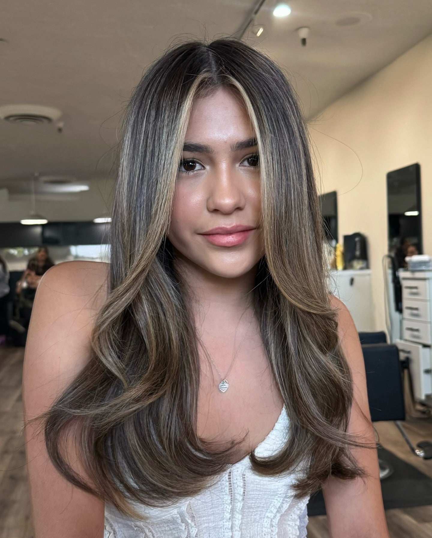 12. Soft Ash Brown Layers with Subtle Blonde Highlights (Hair Color with Highlights)