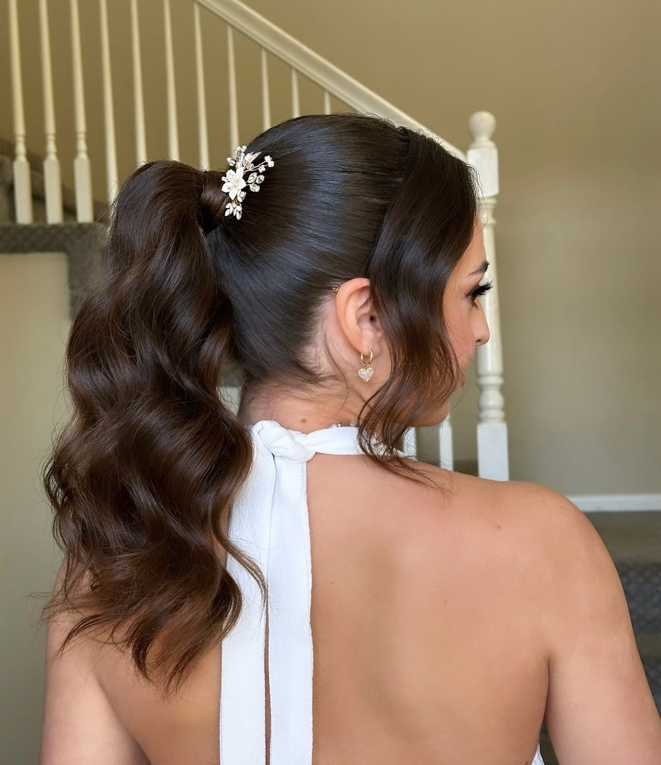 4. Polished Ponytail with Decorative Clip (Elegant Hairstyles)