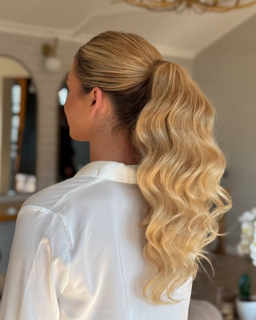 7. Golden Blonde Ponytail with Hollywood Waves (Elegant Hairstyles)