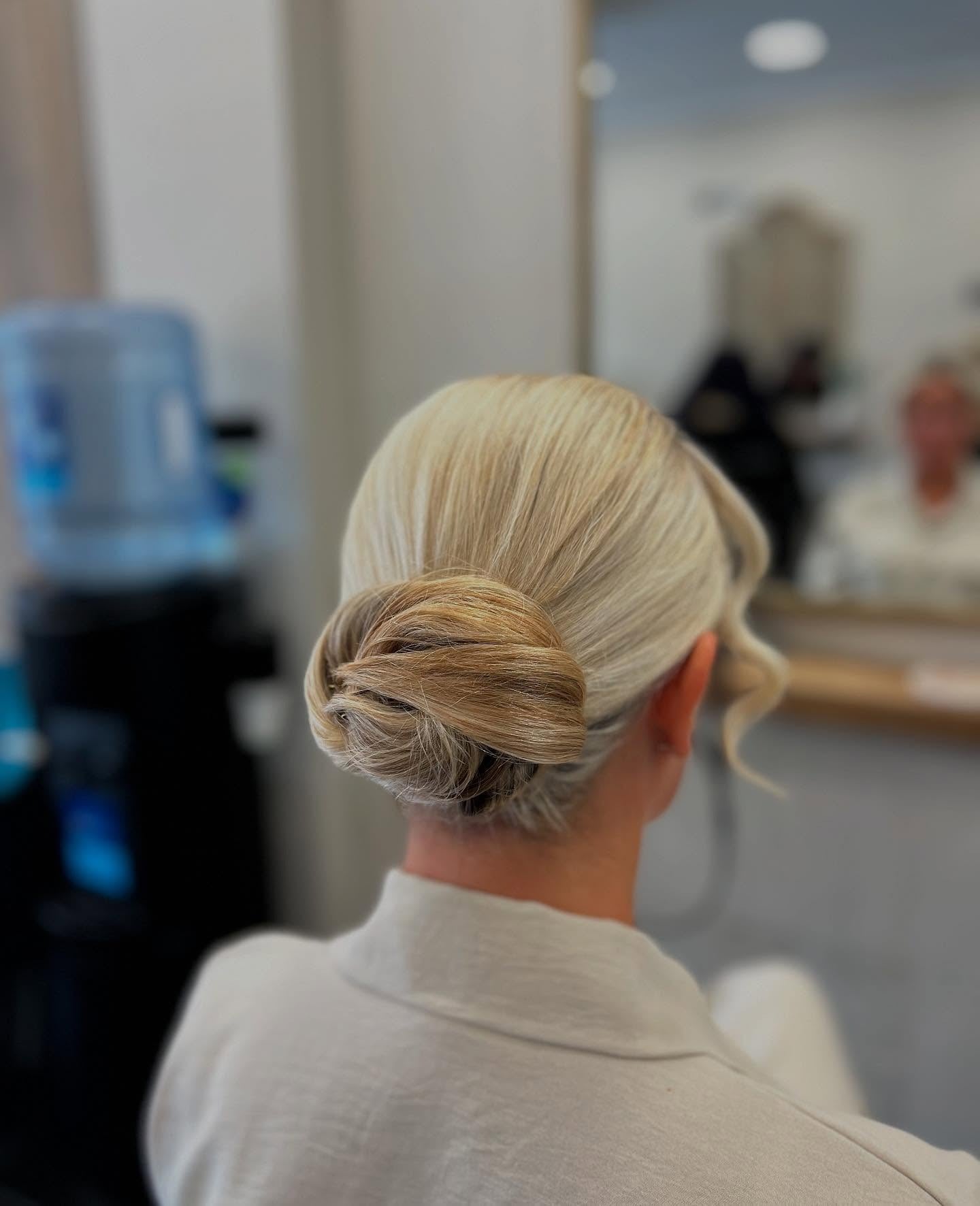 9. Classic Low Chignon with Blonde Finish (Elegant Hairstyles)