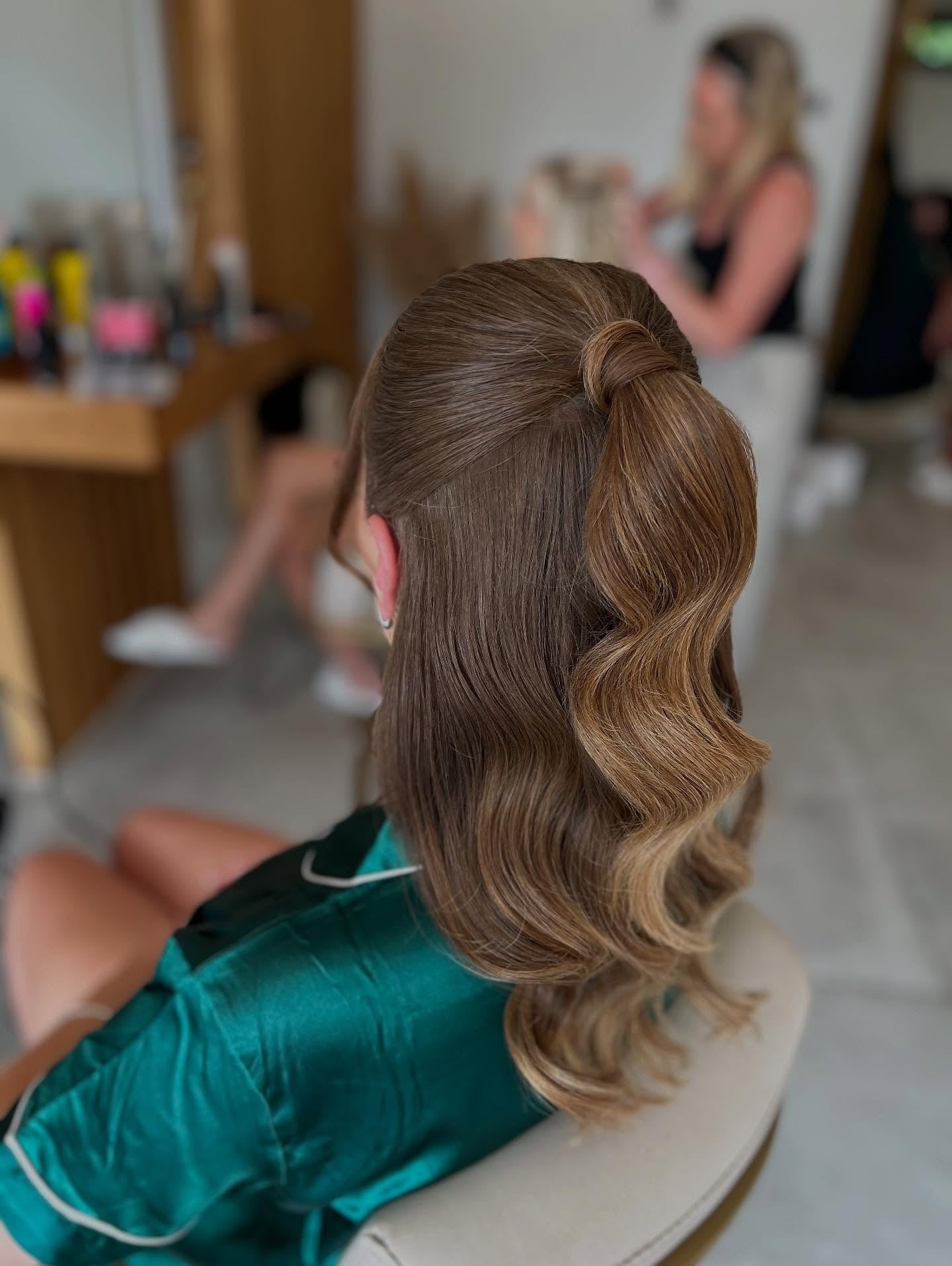 10. Glossy Mid-Ponytail with Sculpted Waves (Elegant Hairstyles)