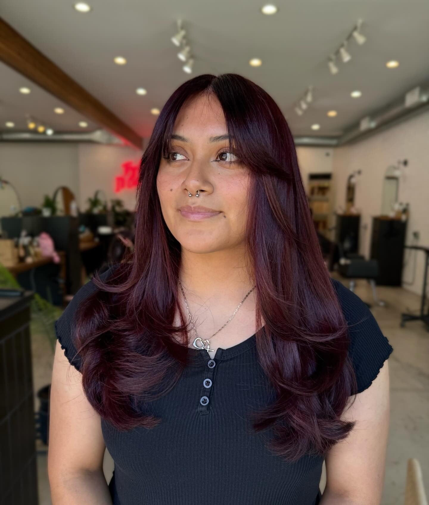 3. Sleek Plum Layers with Curtain Bangs (Plum Hair Color)