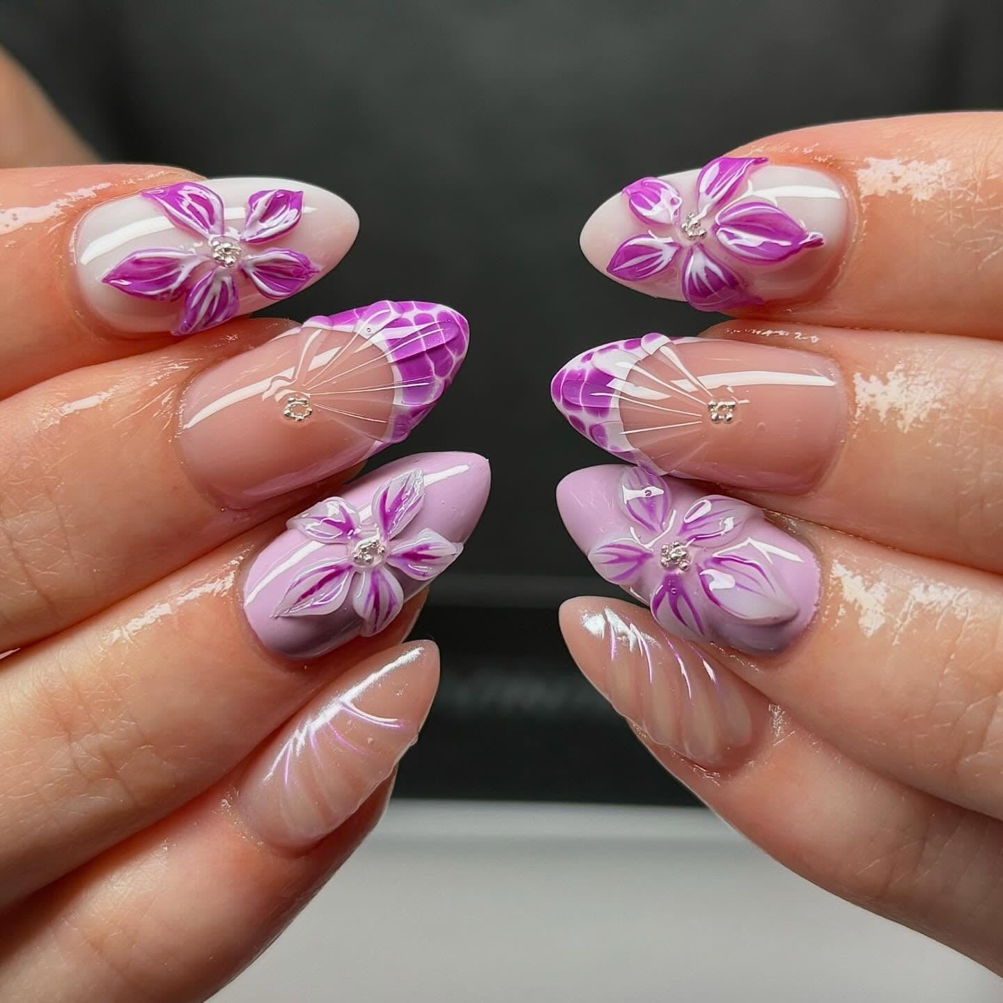 4. 3D Orchid Petal Design with Abstract Accents (Purple Nail Ideas)
