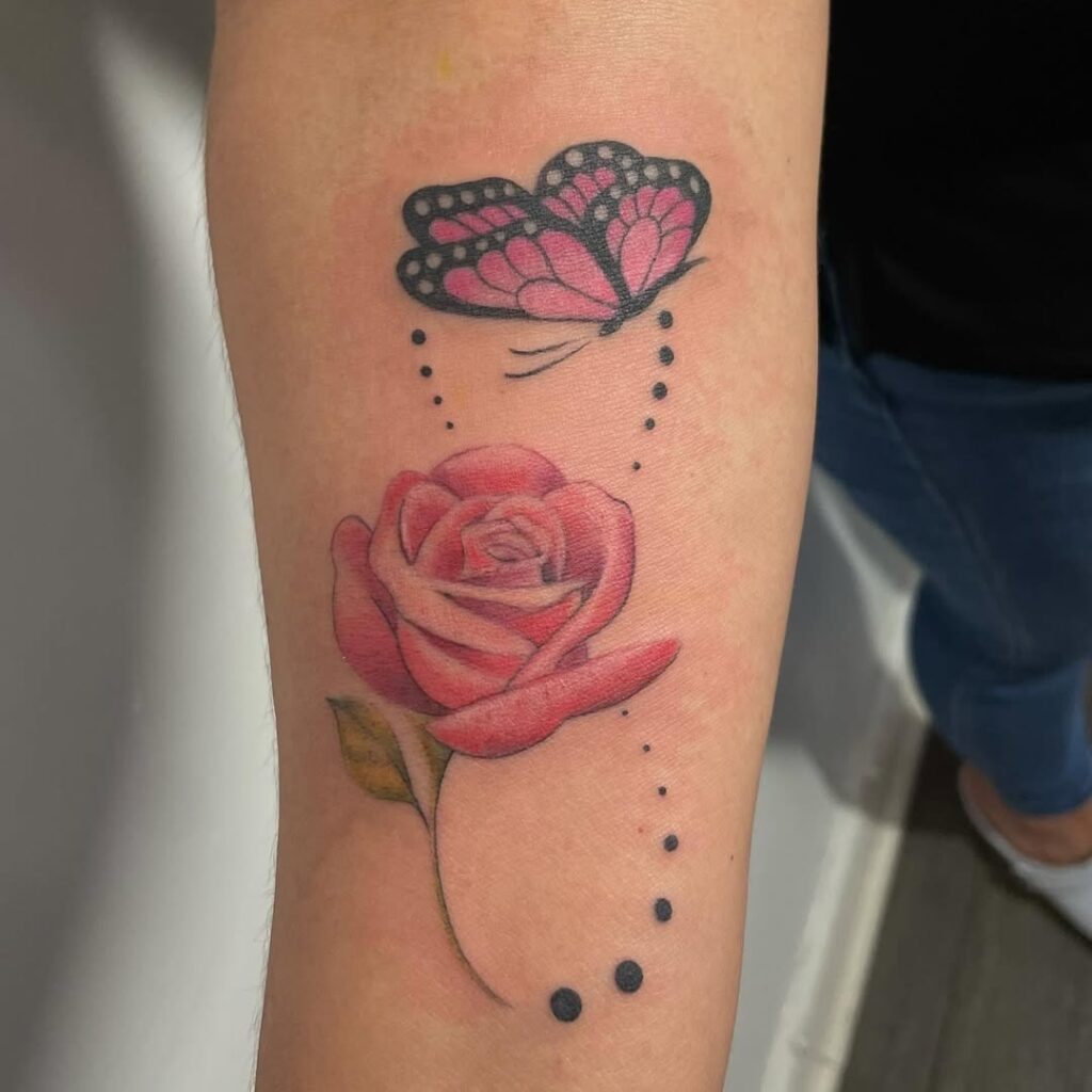 Rose, Butterfly And An Infinity Symbol Tattoo