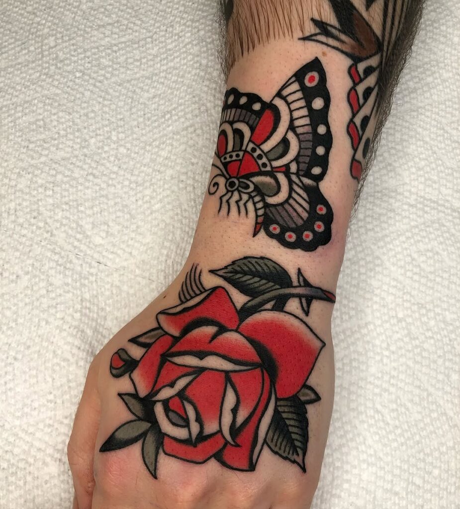 Traditional Rose And Butterfly Tattoo