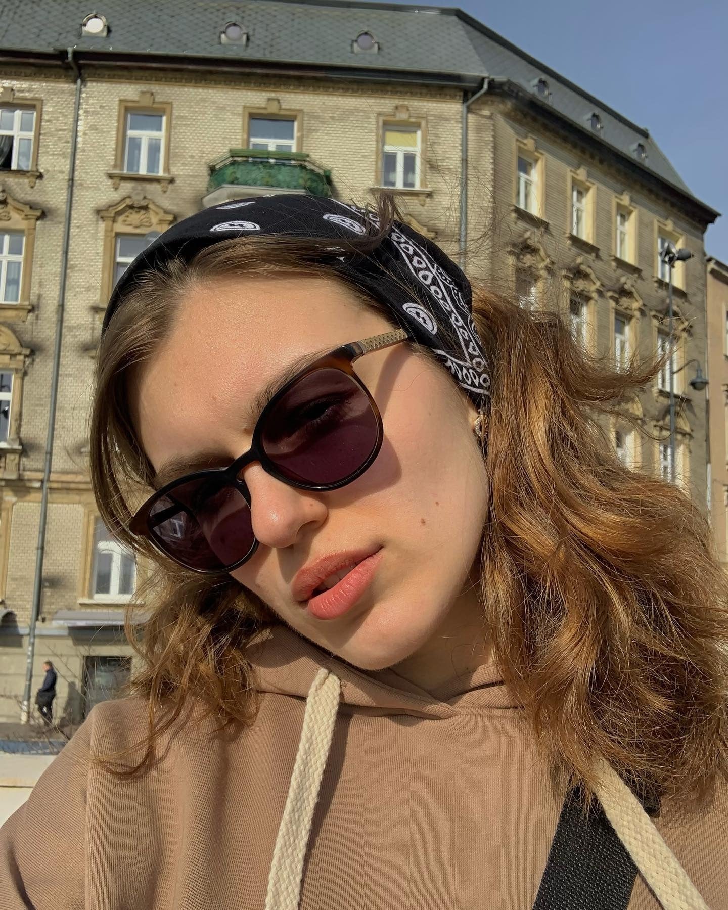 11. Black Paisley Bandana with Tousled Medium Waves (Bandana Hairstyles)