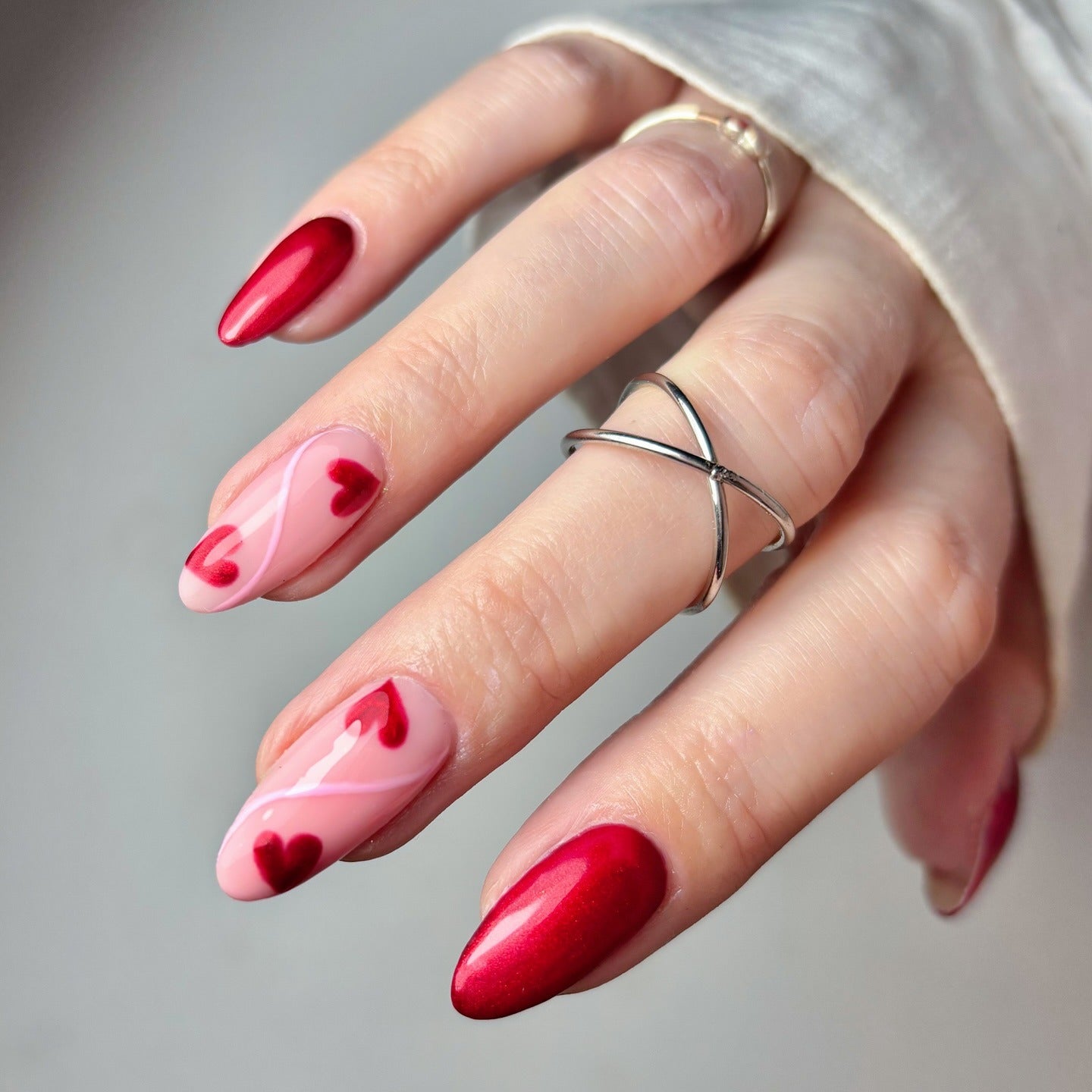 11. Metallic Red & Soft Heart Swirls (Heart Nail Ideas)