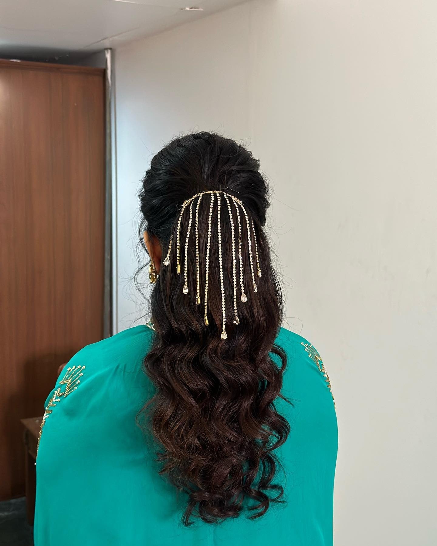 5. Decorated Ponytail with Cascading Chains – Jet Black (Ponytail Hairstyles)