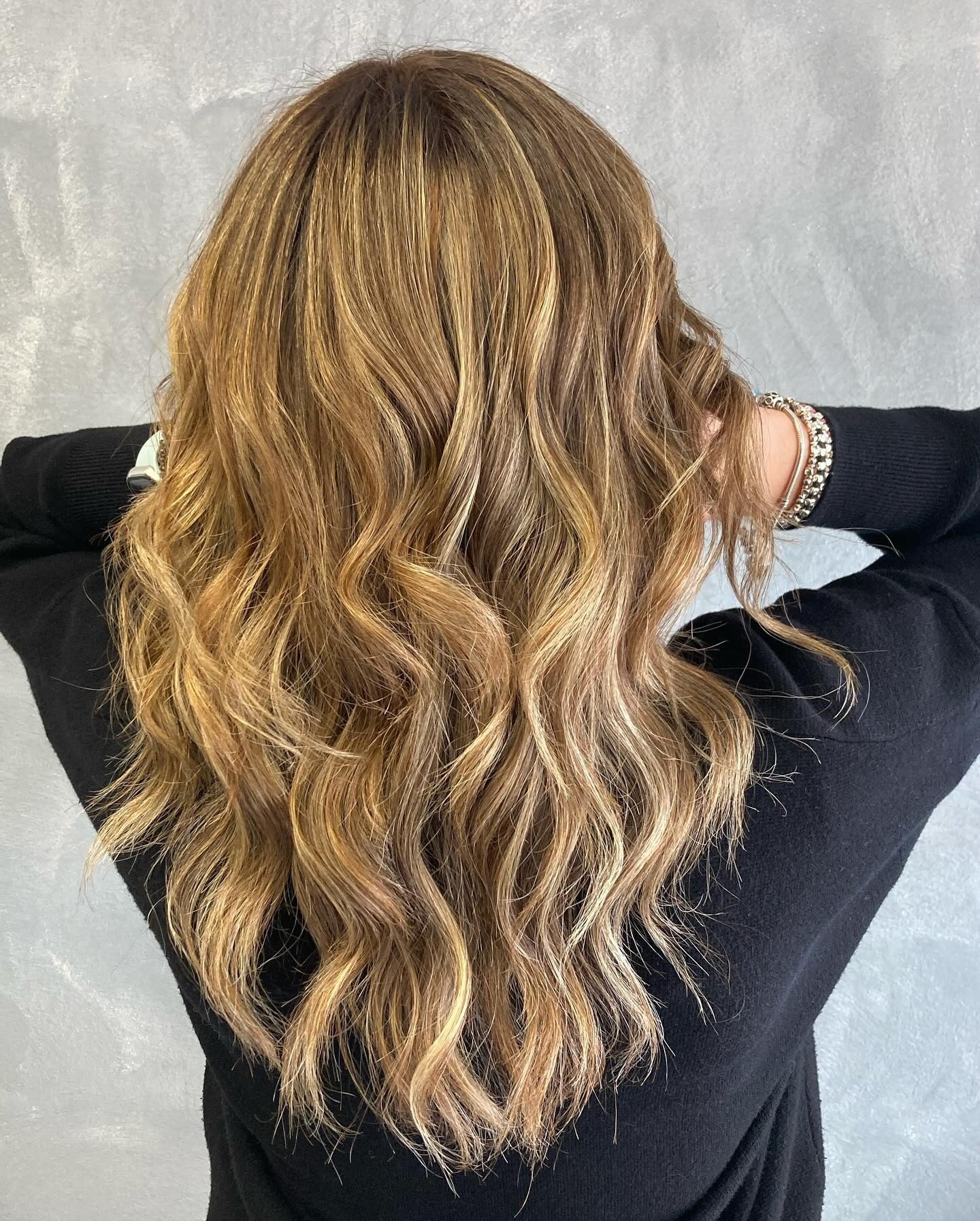 1. Sunlit Honey Waves (Warm Blonde Hair Color)