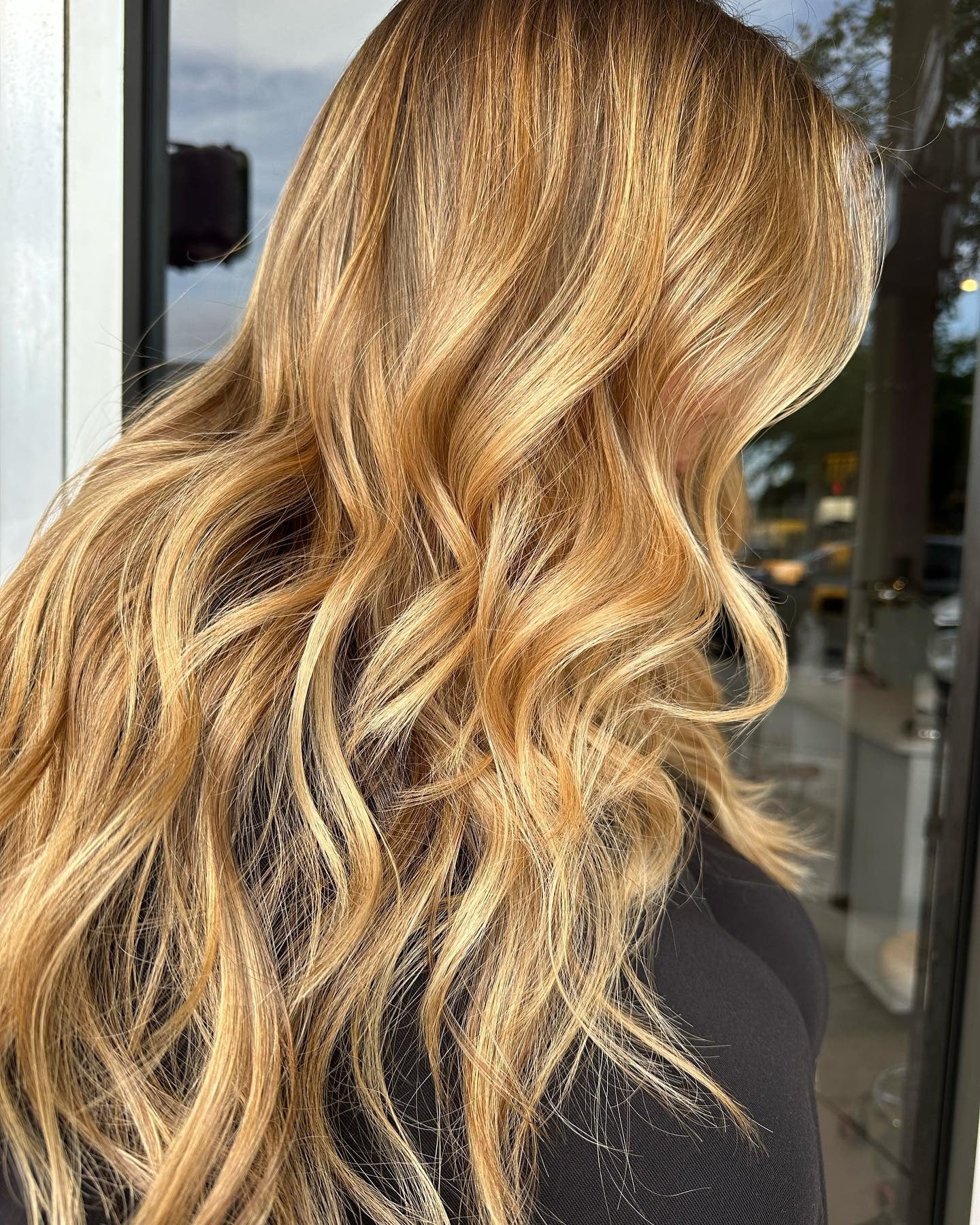 2. Golden Glow Layers (Warm Blonde Hair Color)