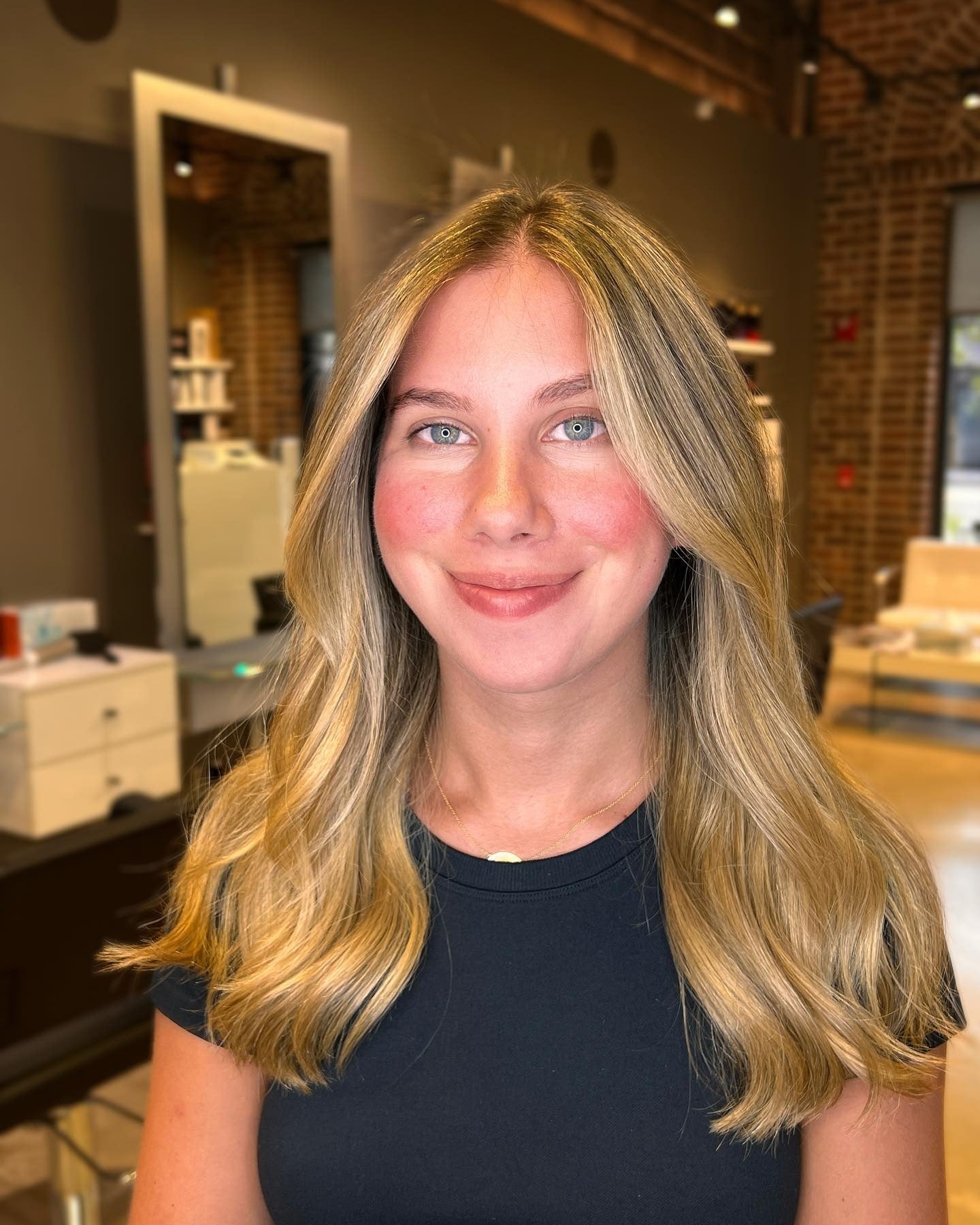 6. Golden Face-Framing Layers (Warm Blonde Hair Color)