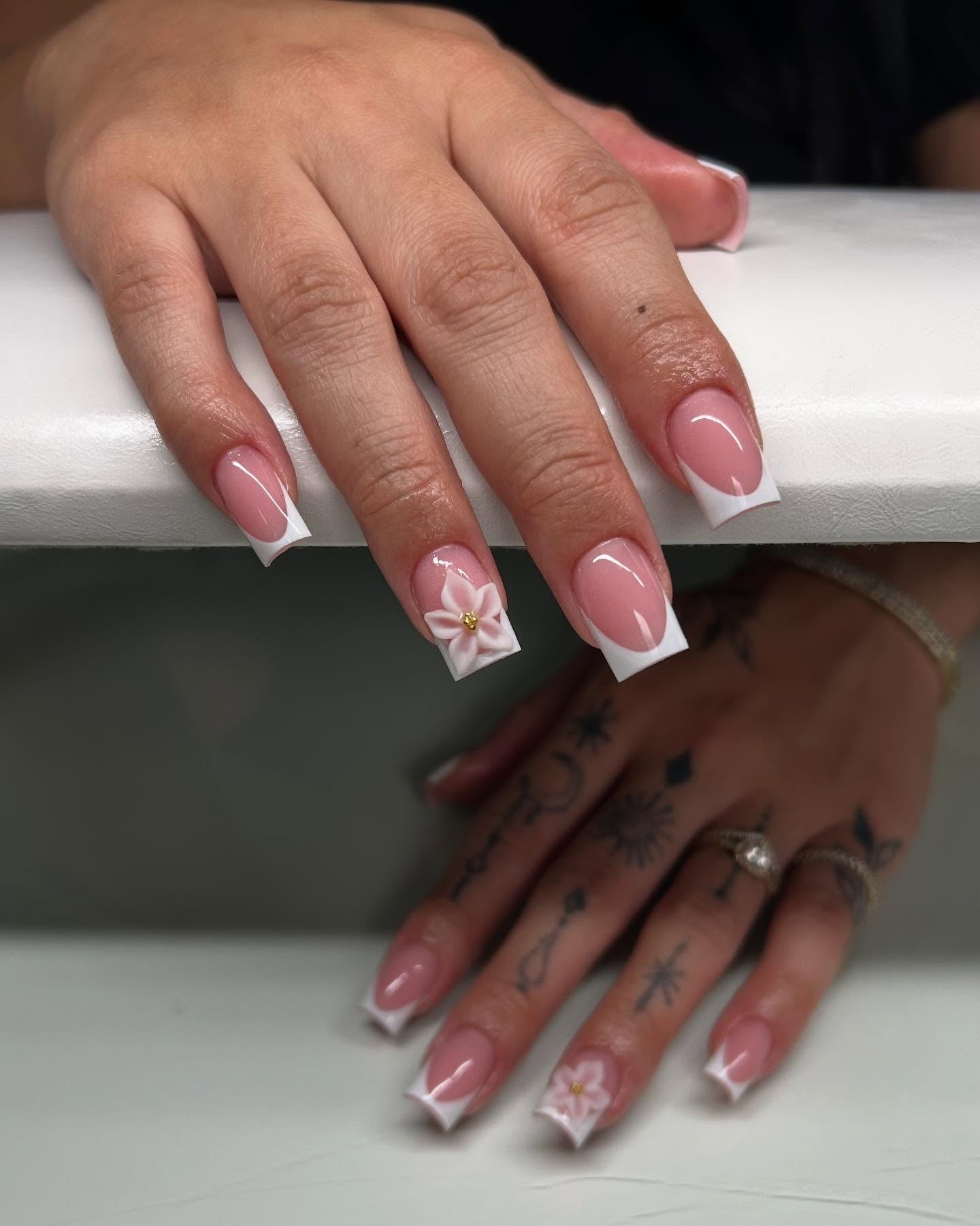 4. Soft Square French with White Petal Detail (White Tip Nail Ideas)