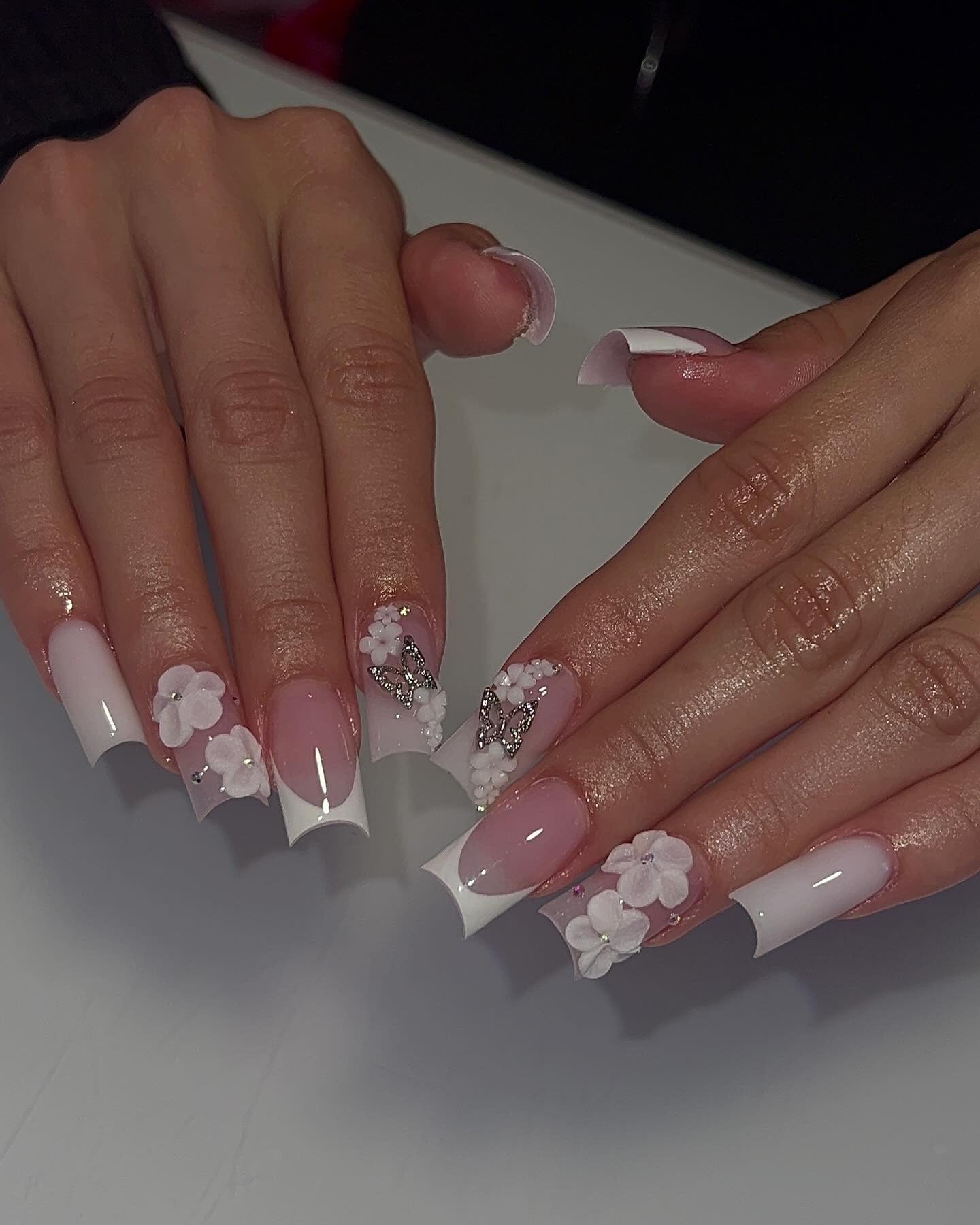 5. French Floral Set with Butterfly Sparkle (White Tip Nail Ideas)
