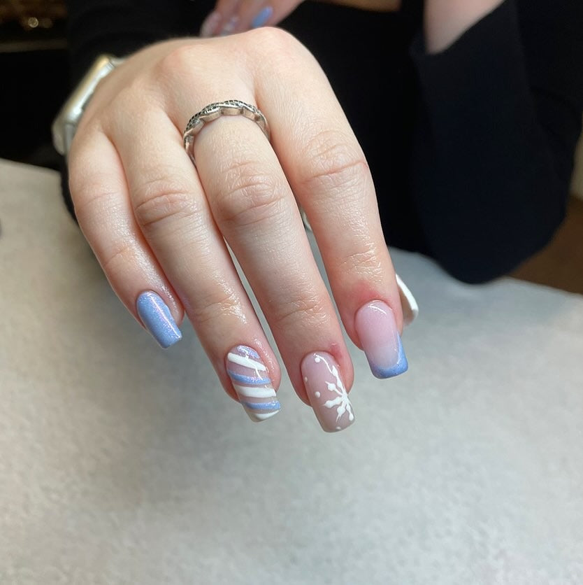 1. Frosted Blue Swirl Nails (Winter Nail Ideas)