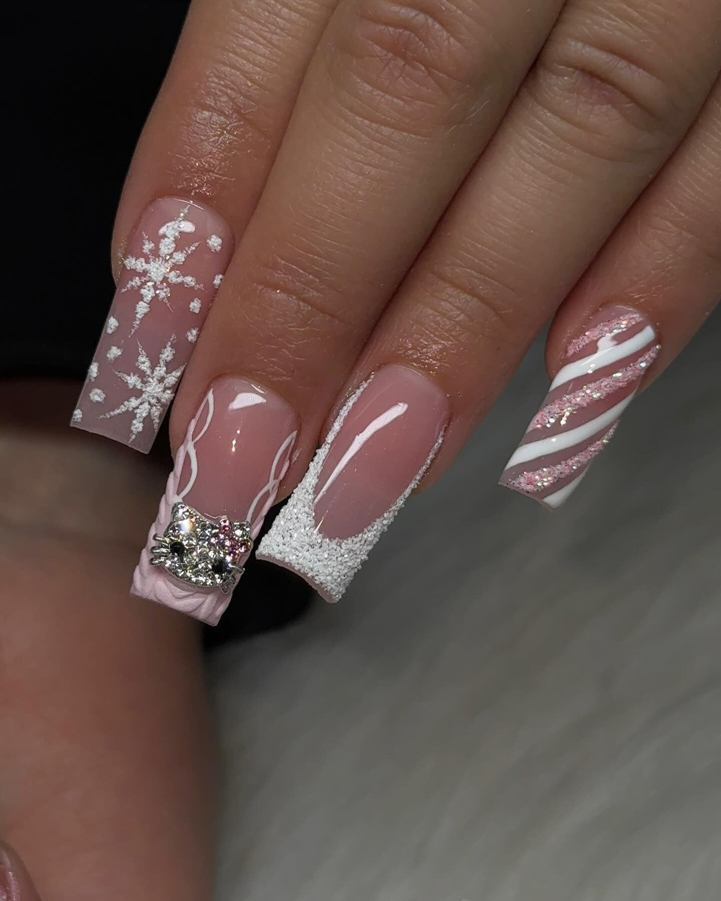 3. Textured Pink Snowflake Nails (Winter Nail Ideas)