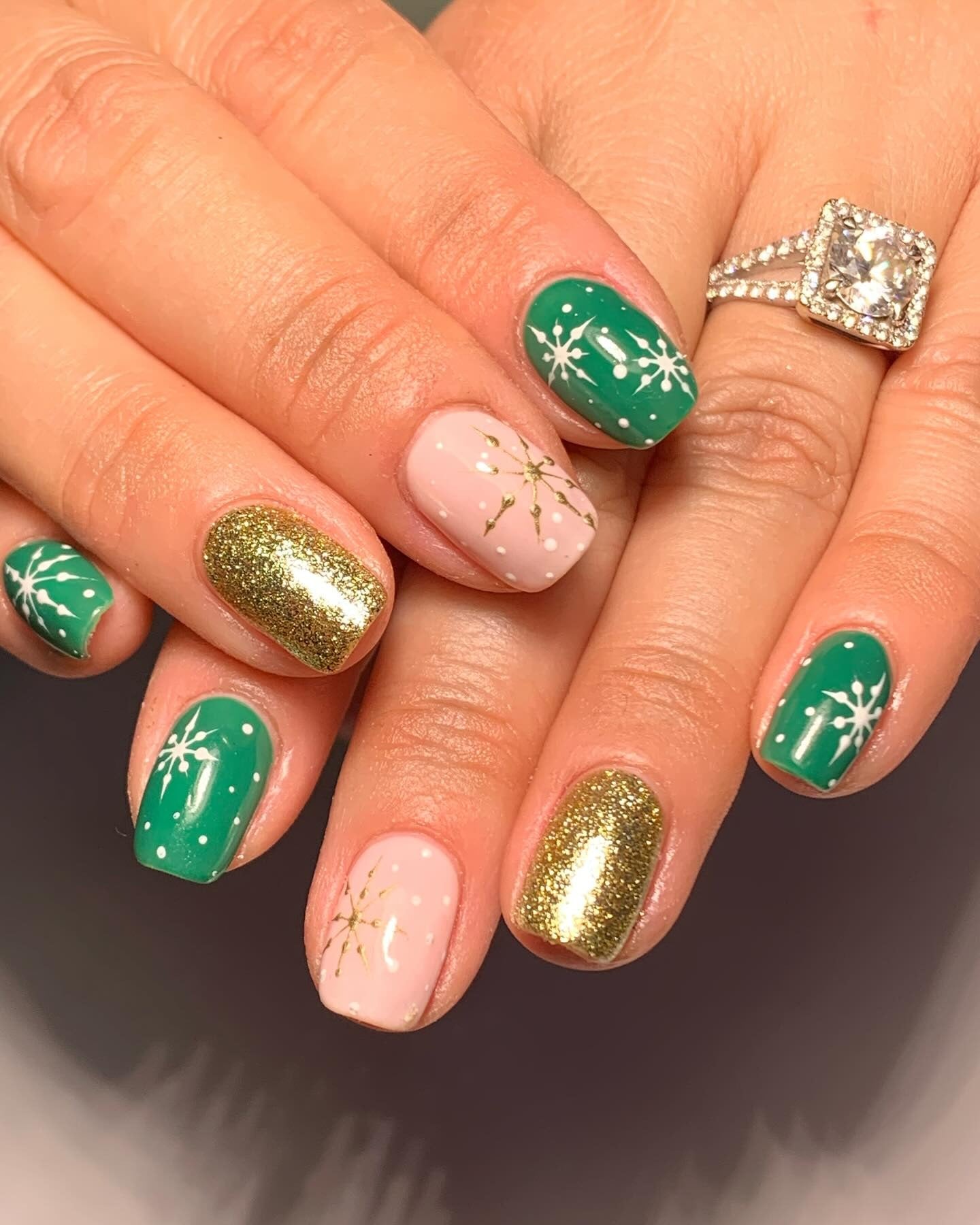6. Green & Gold Snowflake Nails (Winter Nail Ideas)