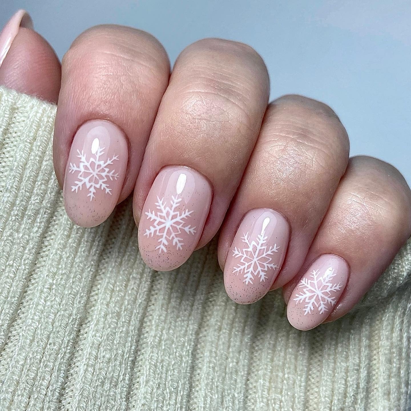 9. Soft Pink Snowflake Shorties (Winter Nail Ideas)