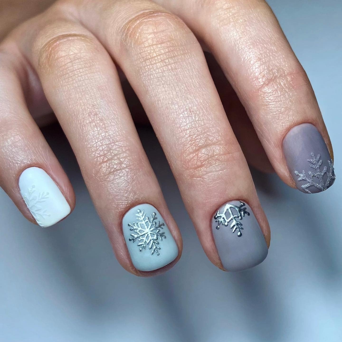 10. Matte Frost Grey Snowflake Nails (Winter Nail Ideas)
