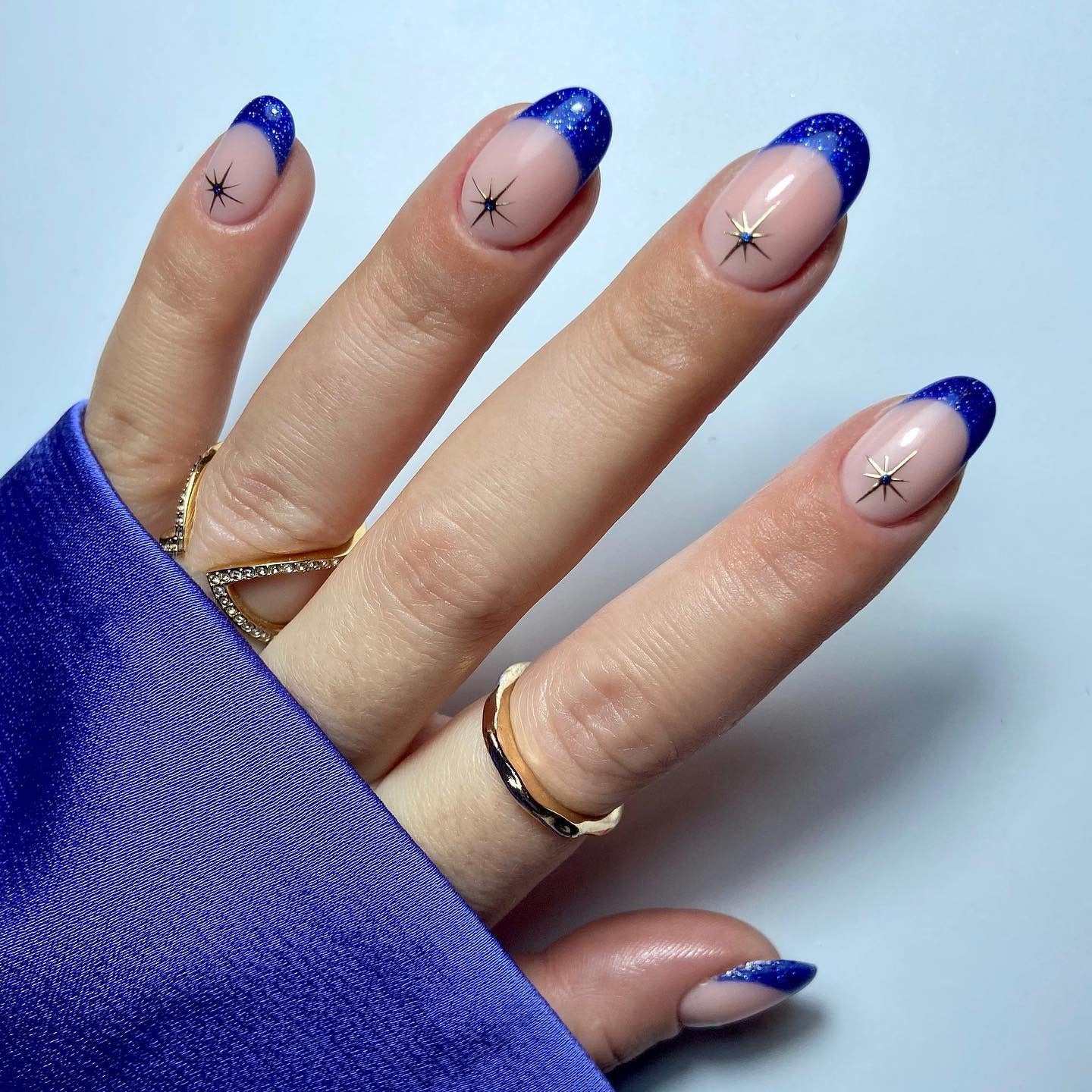 12. Midnight French with Star Accents (Winter Nail Ideas)