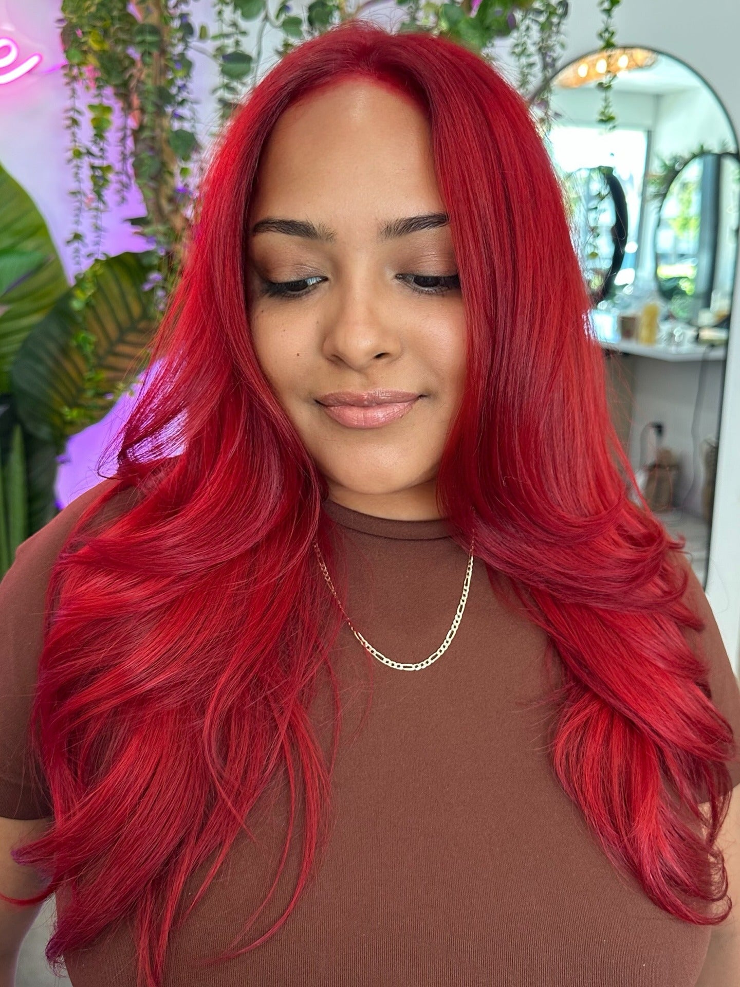 14. Bright Scarlet Layers with Face-Framing Dimension (Red Hair Color)