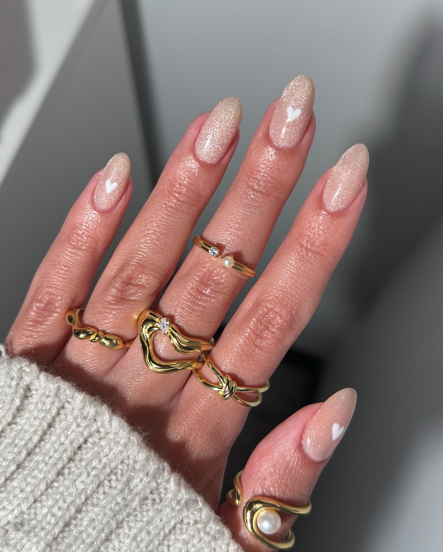 2. Glitter Blush with Mini Hearts (Basic Nail Ideas)