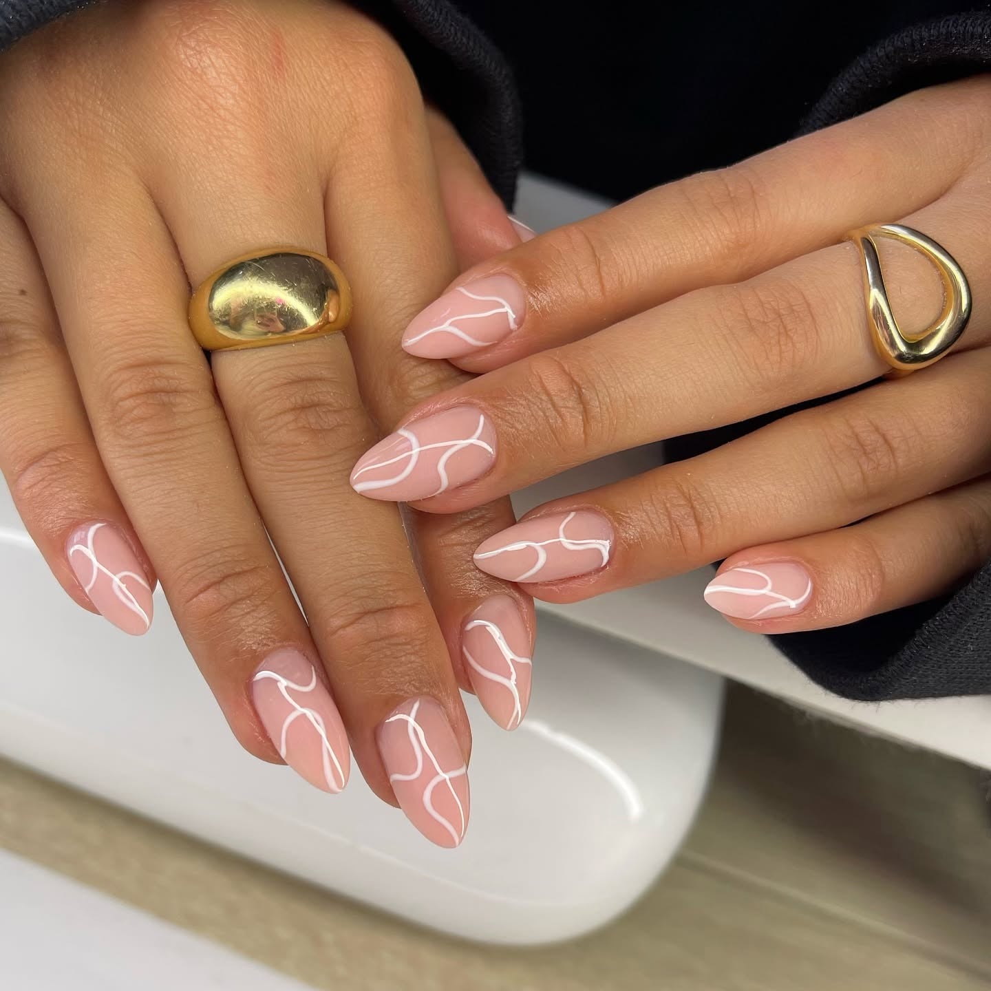 3. Creamy Nude with White Contour Lines (Basic Nail Ideas)