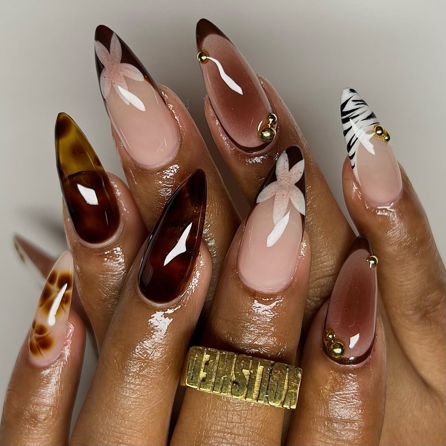 14. Floral and Animal-Inspired Brown Art (Brown Nail Ideas)