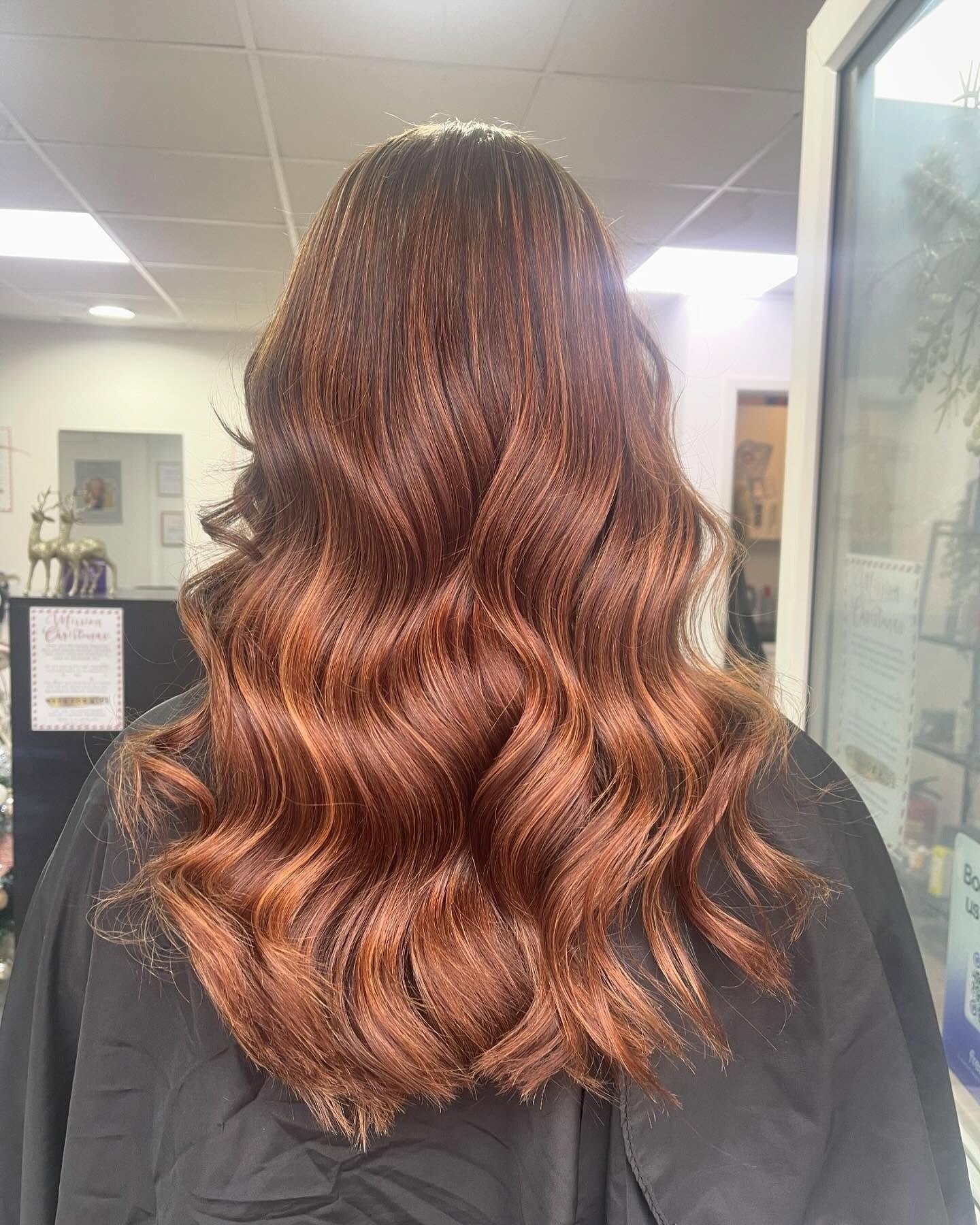 13. Copper-Infused Chestnut Gloss Waves (Chestnut Hair Color)