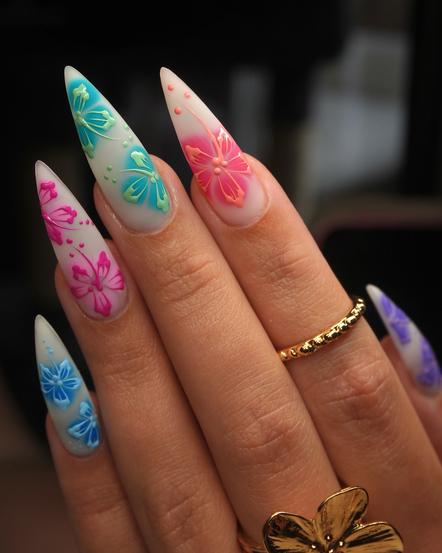 3. Neon Bloom Gradient with Butterfly Detail (Flower Nail Ideas)