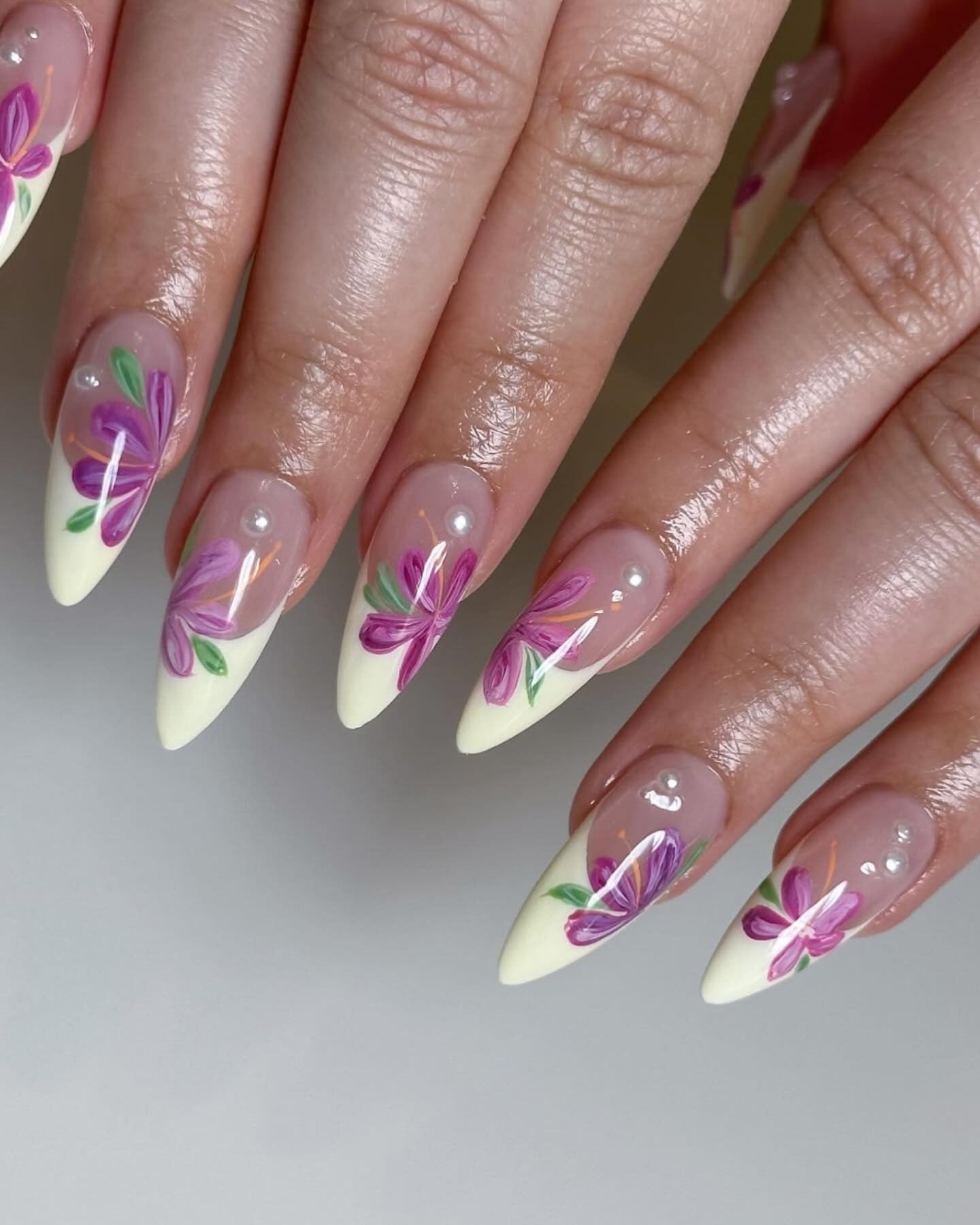 7. Hand-Painted Purple Petals with Pearl Accents (Flower Nail Ideas)