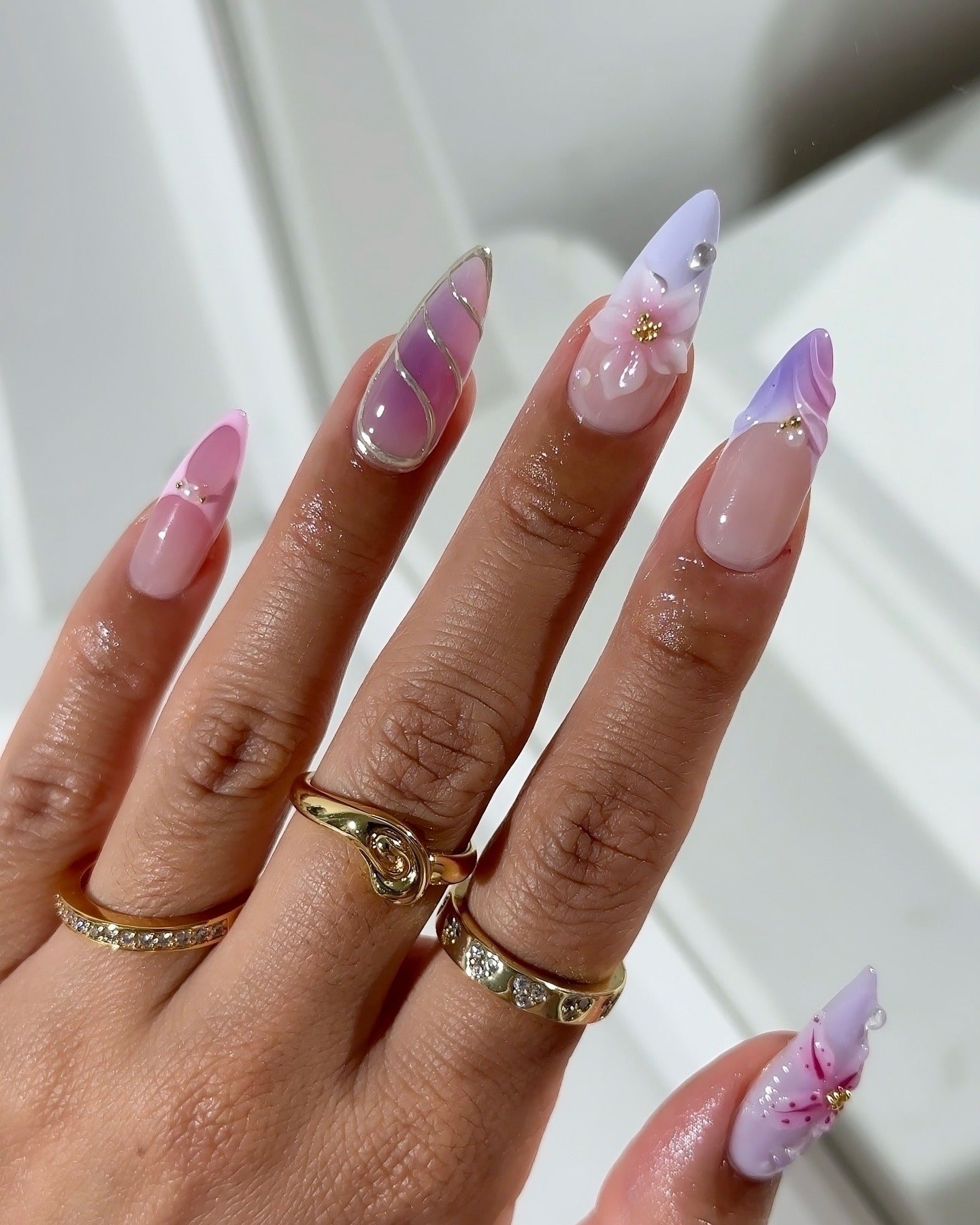 8. Lavender Dream with Fluid Marble and Floral Highlights (Flower Nail Ideas)