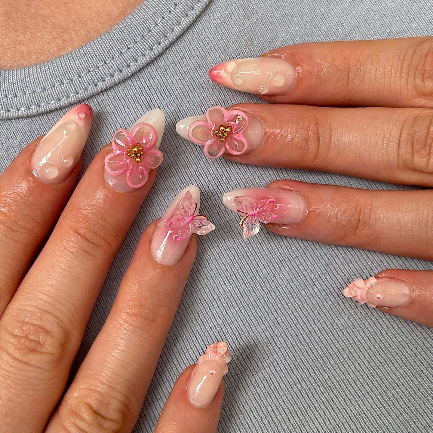 15. Pink Blossom and Butterfly Fantasy (Flower Nail Ideas)