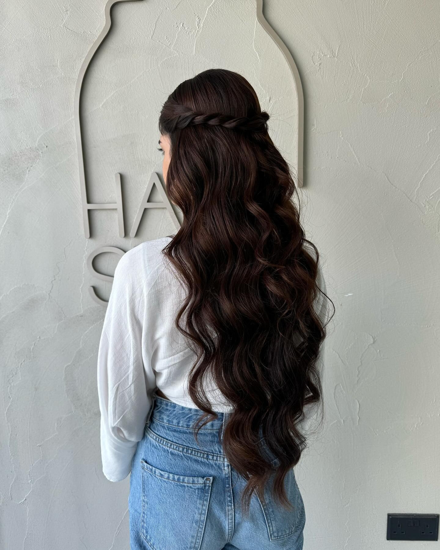 6. Twisted Half-Up with Cascading Dark Waves (Wavy Hairstyles)