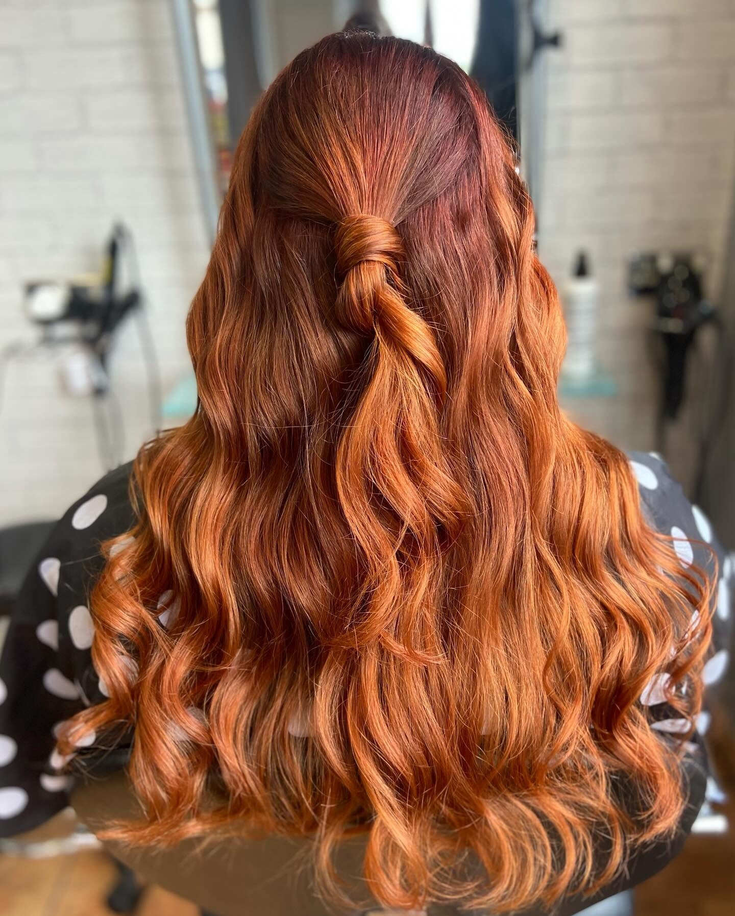 6. Curled Knot Half-Up with Dimensional Copper (Copper Hair Color)