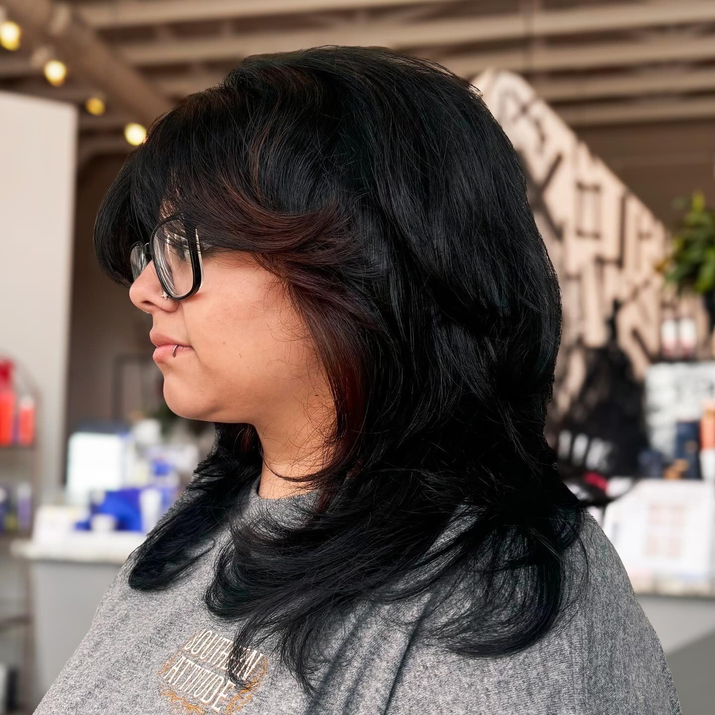 2. Jet Black Layered Wolf Cut with Volume Bangs (Wolf Haircuts)