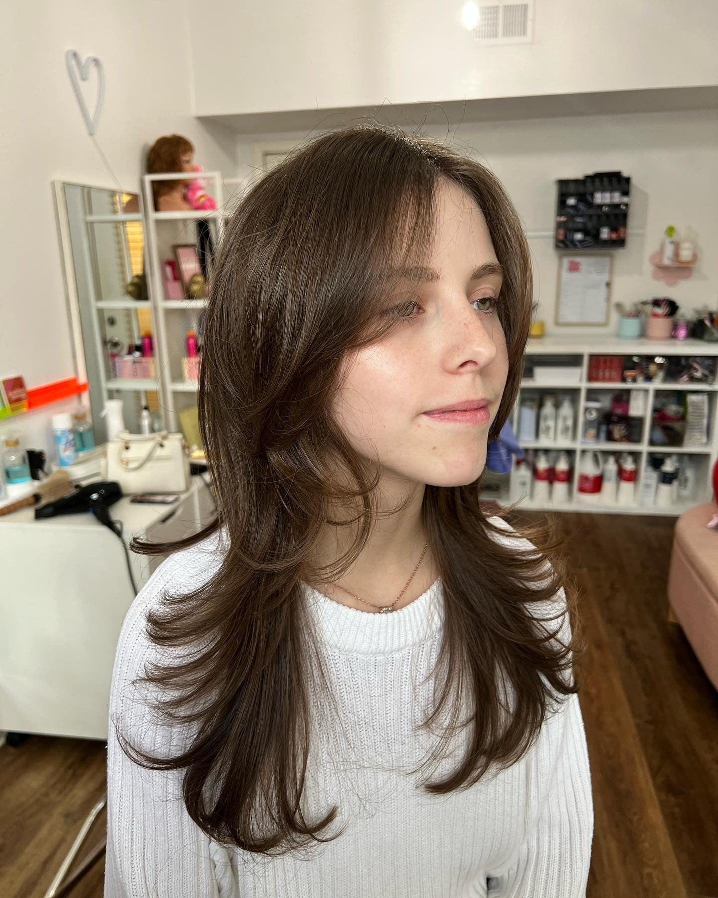 7. Long Flicked Layers with Soft Curtain Fringe (Wolf Haircuts)