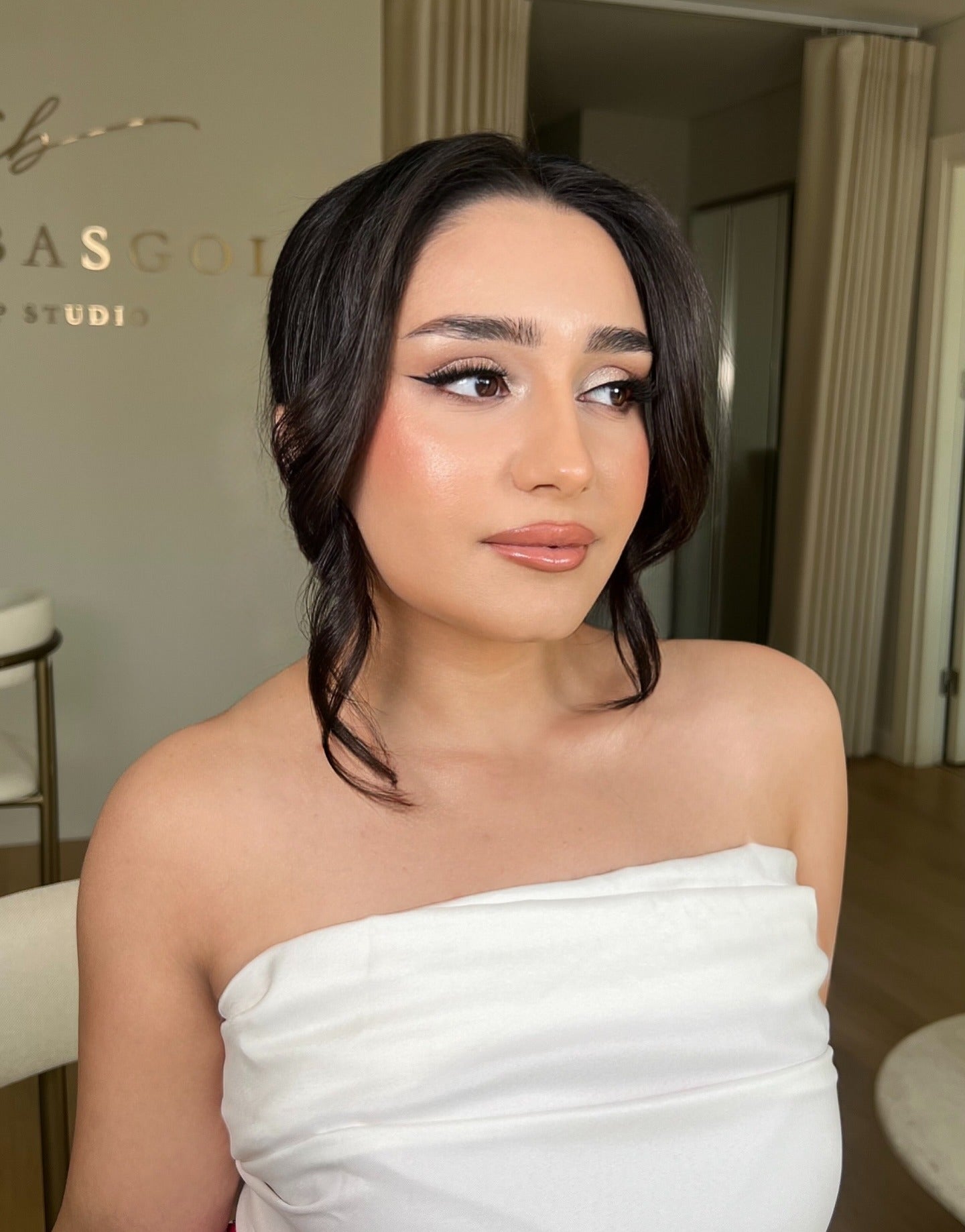 11. Soft Low Updo with Face-Framing Strands (Bride Hairstyles)