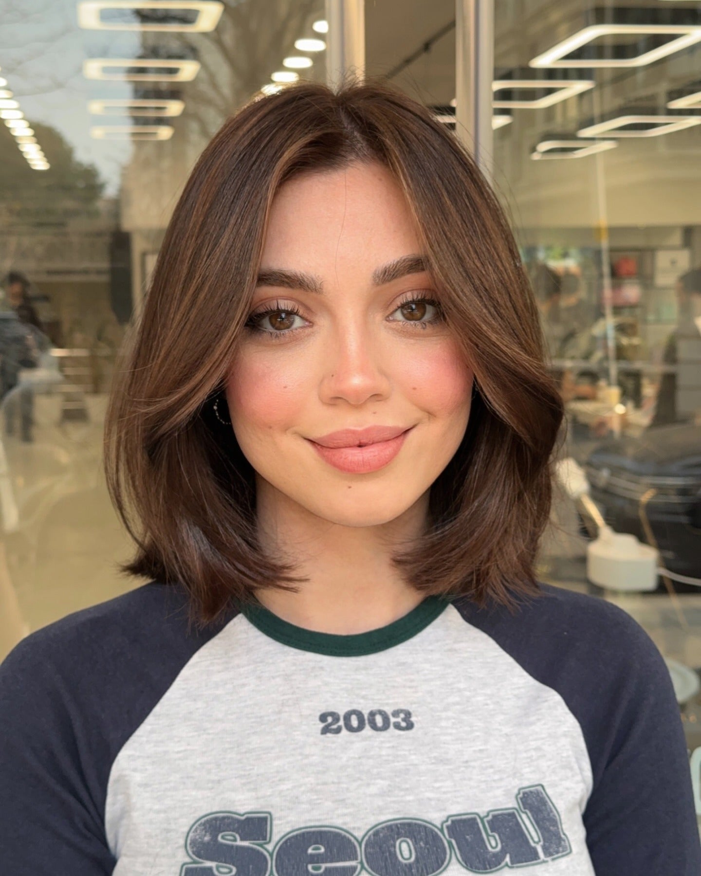 16. Classic Lob with Subtle Caramel Accents (Short Layered Haircuts)